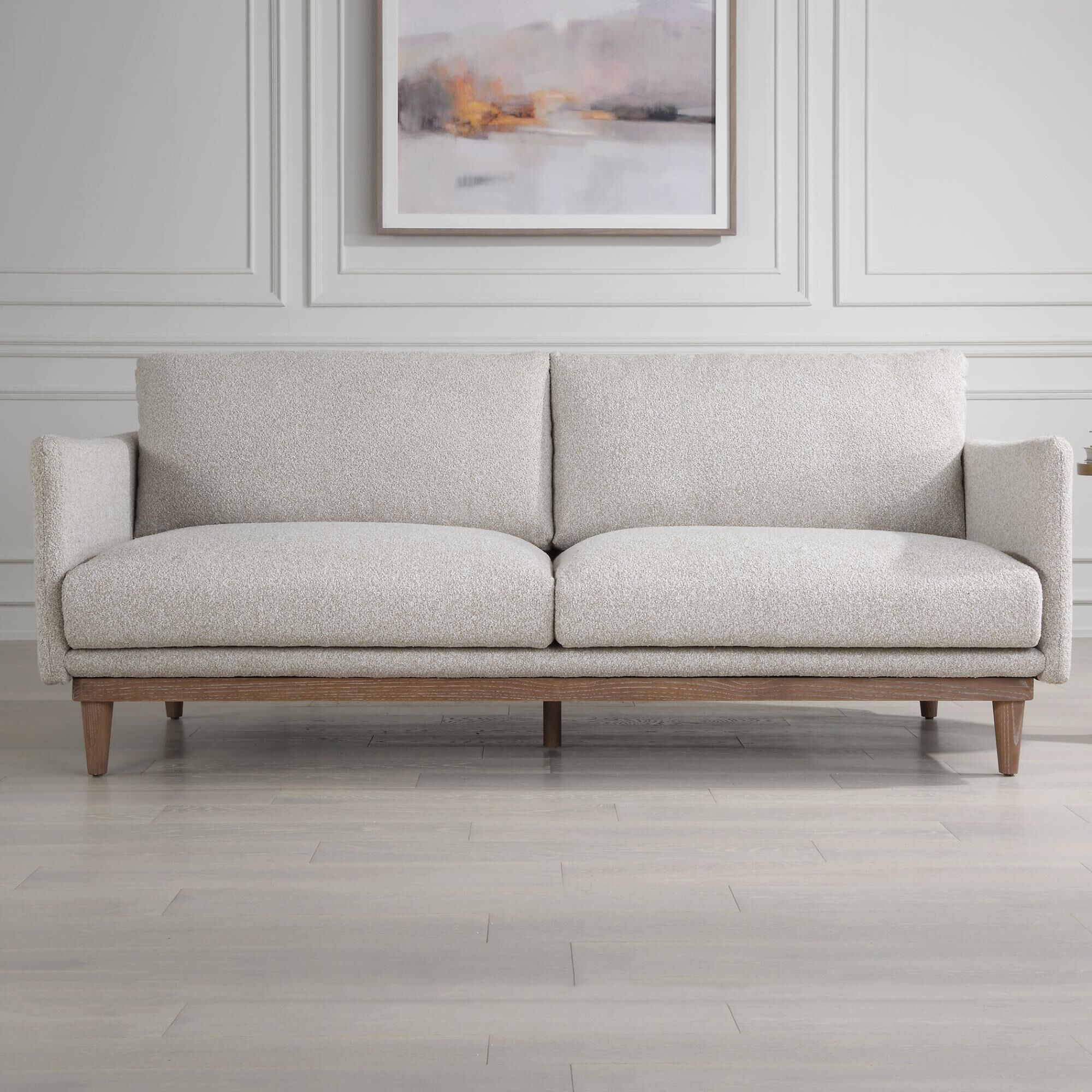 Shown in Relax In The Sink-In Comfort Of The Freefall Sofa. Featuring Clean Modern Lines And Resting On A Sol finish