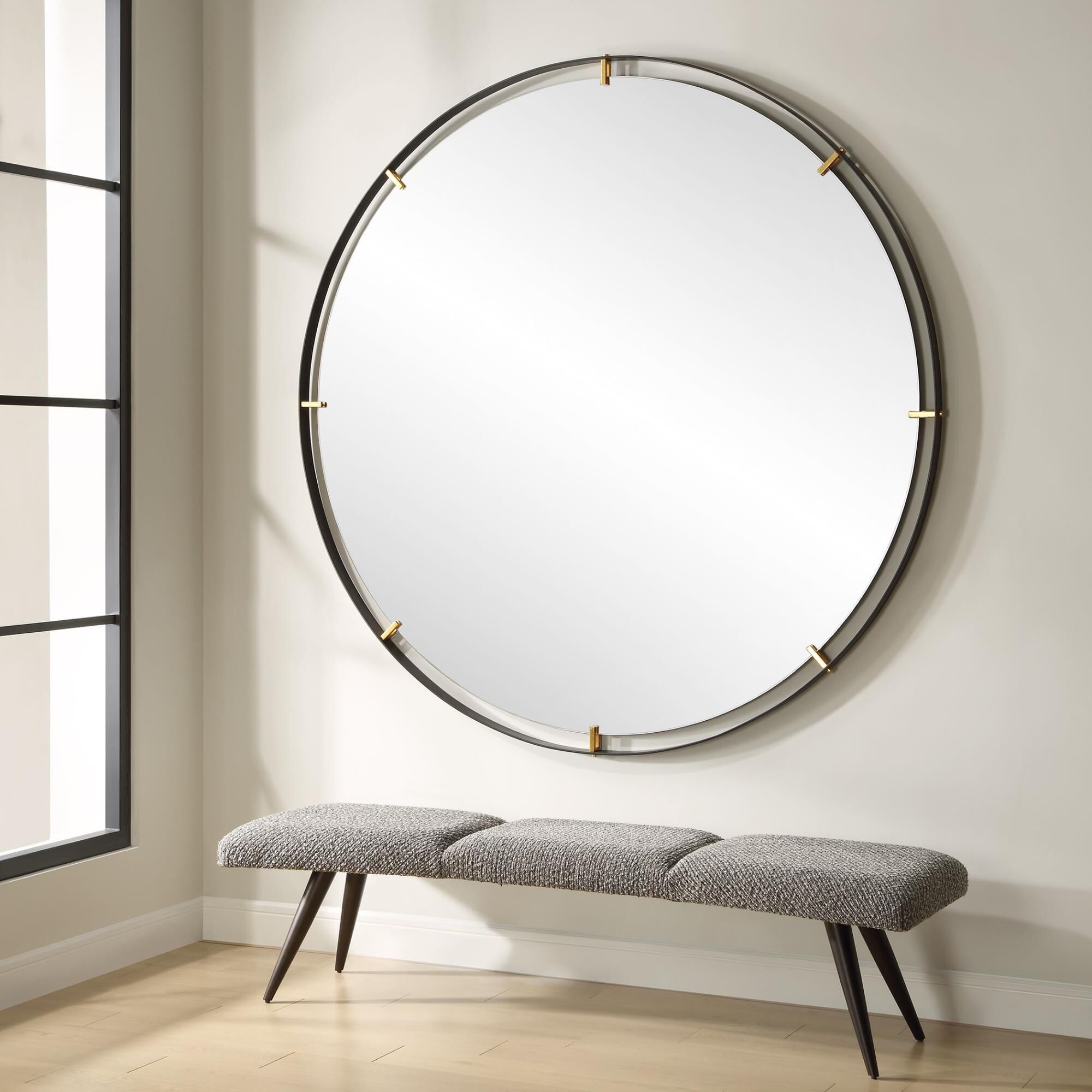 Shown in Elevate Your Home Decor With Our Grand Pendulum Round Mirror. Crafted With A Hefty Black Iron Frame  finish