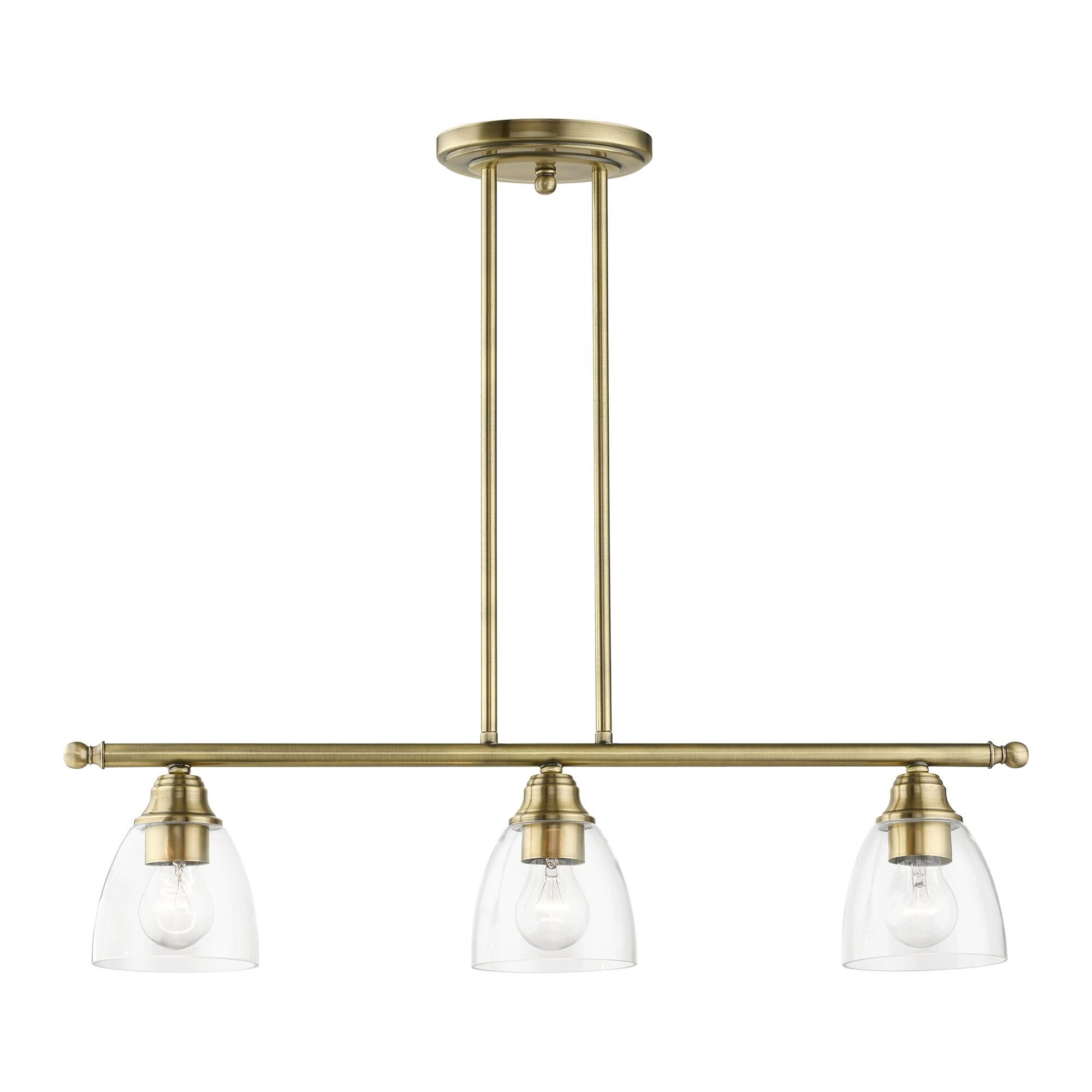 Shown in Antique Brass finish and Hand Blown Clear glass