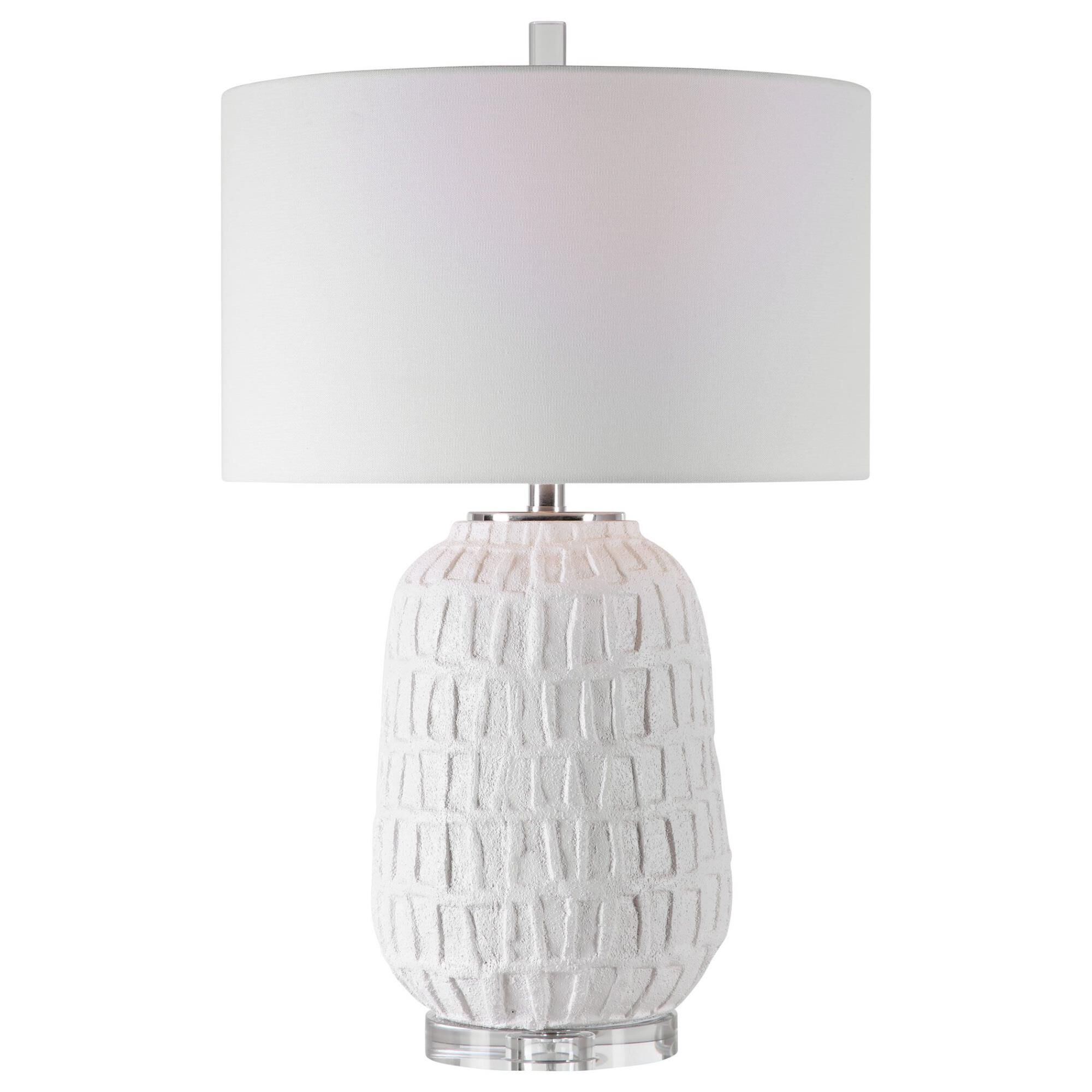 Shown in A Modern Take On Old World Style, This Table Lamp Features A Textured, Matte White Ceramic Base With finish and Drum Hardback  Rolled Edge shade