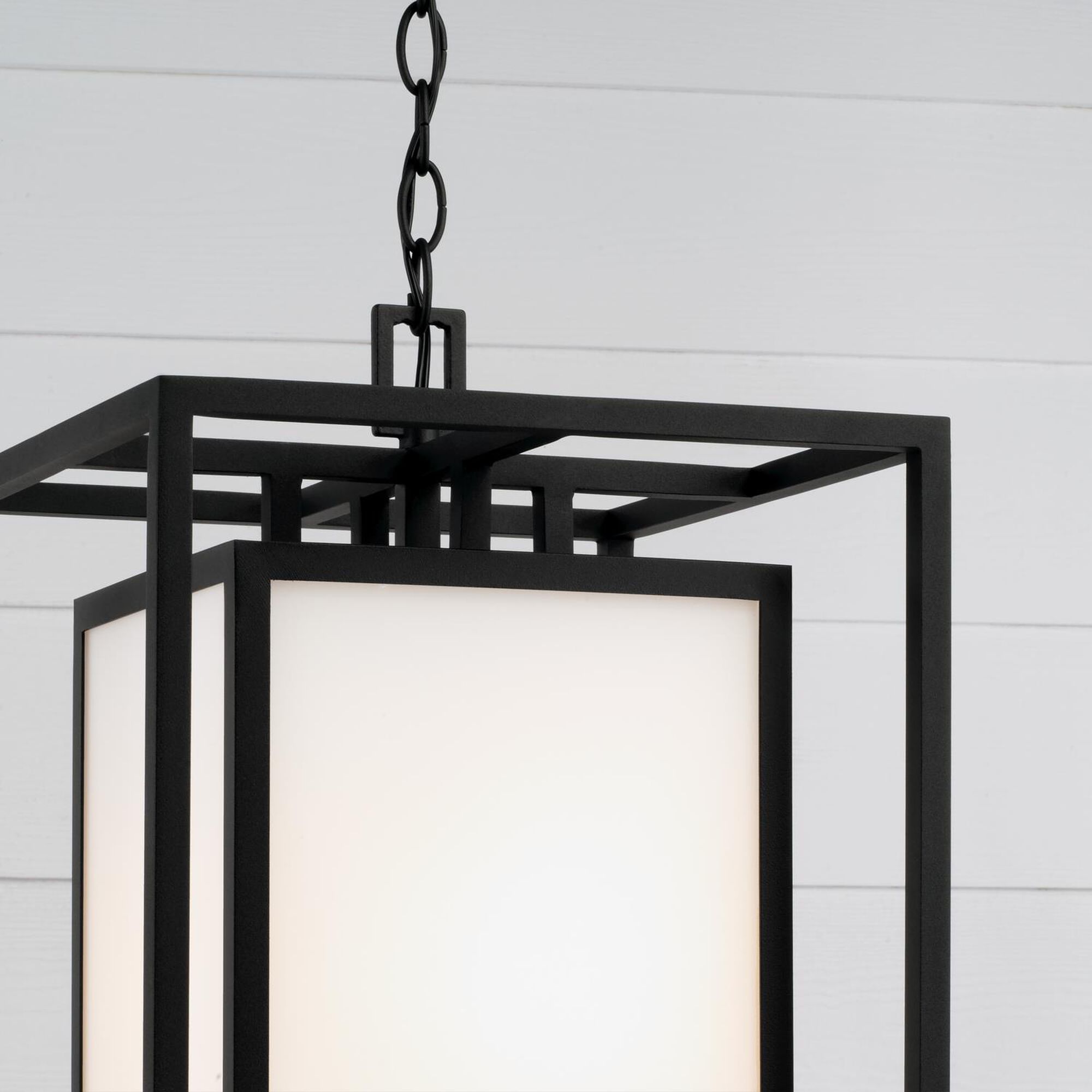 Shown in Black finish and Soft White glass