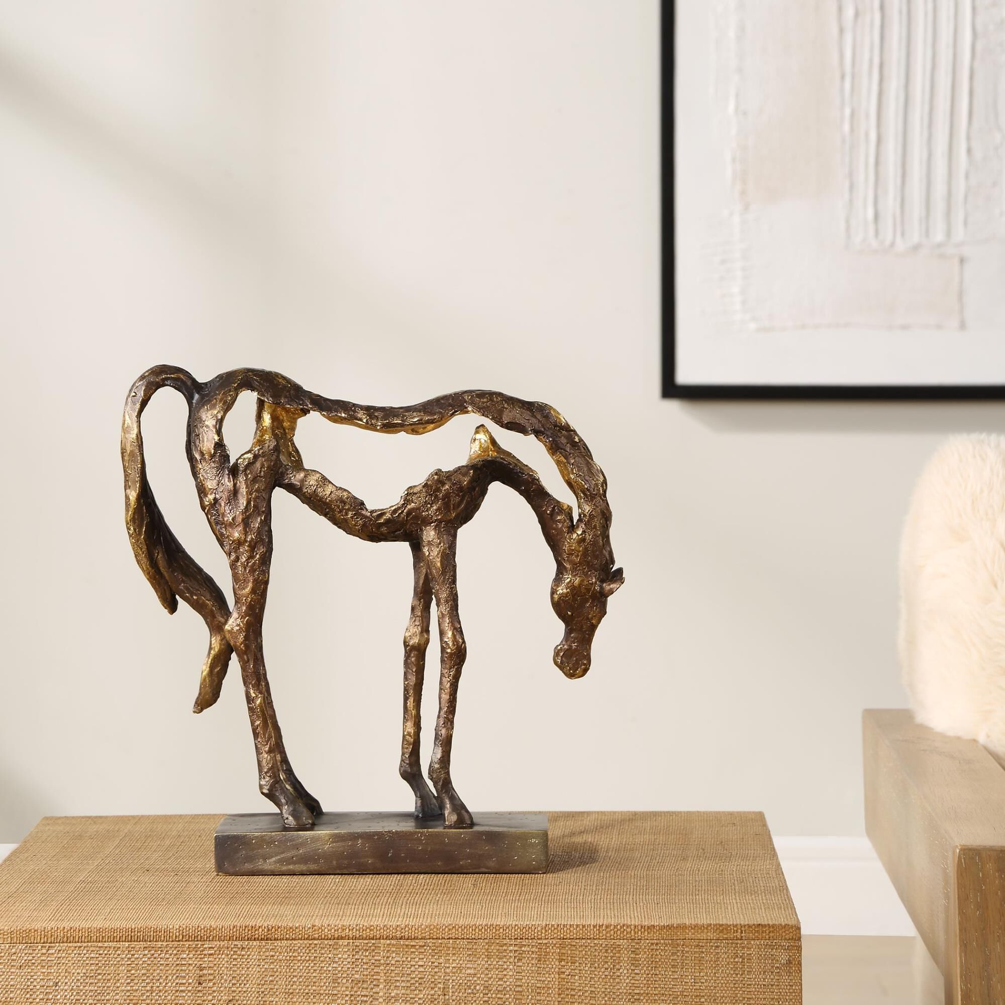 Shown in Openly Sculpted, Grazing Horse Sculpture Finished In A Heavily Textured, Antiqued Bronze With Dark B finish