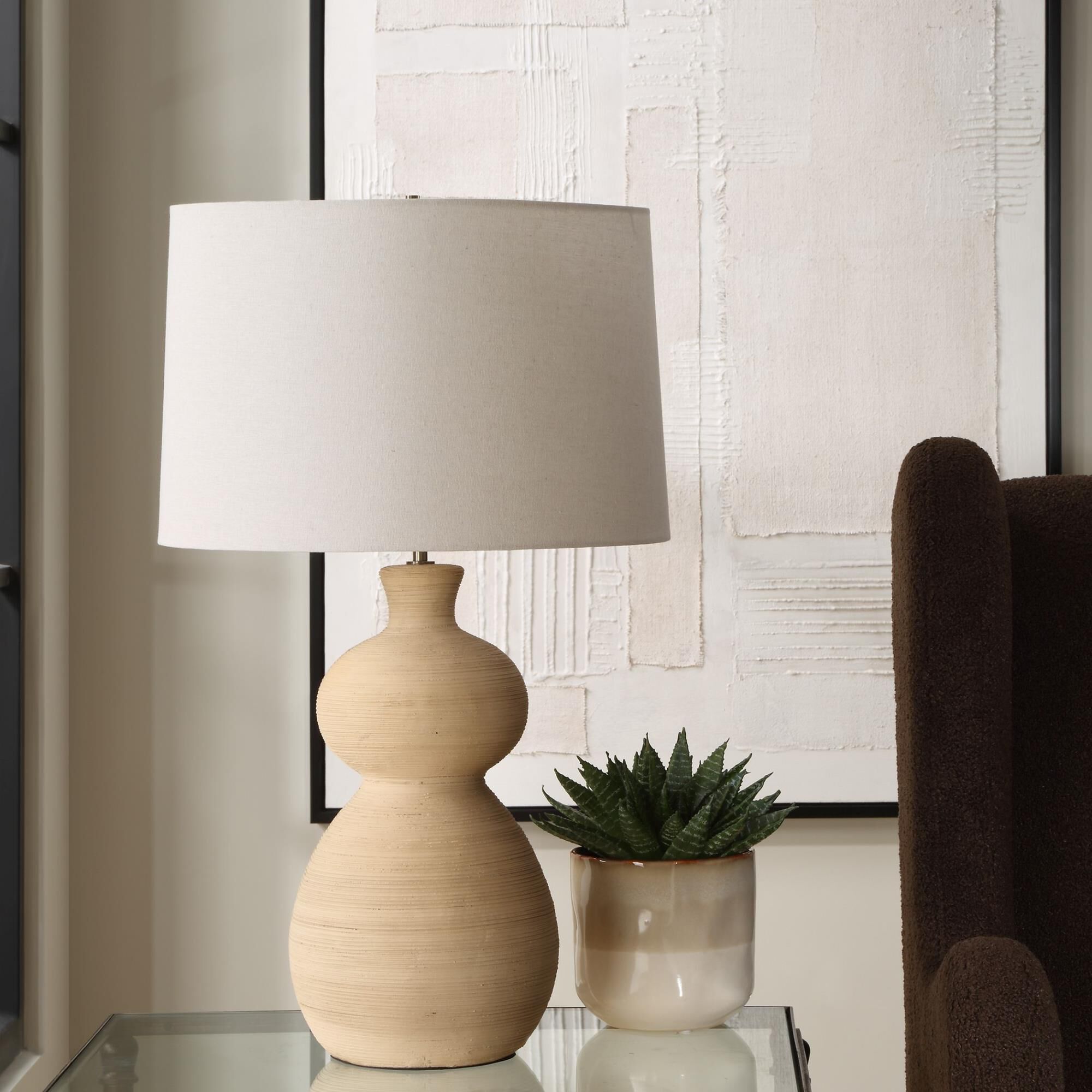 Shown in The Pueblo Table Lamp Combines The Rustic Beauty Of The Southwest With A Touch Of Timeless Elegance  finish and Round Hardback shade