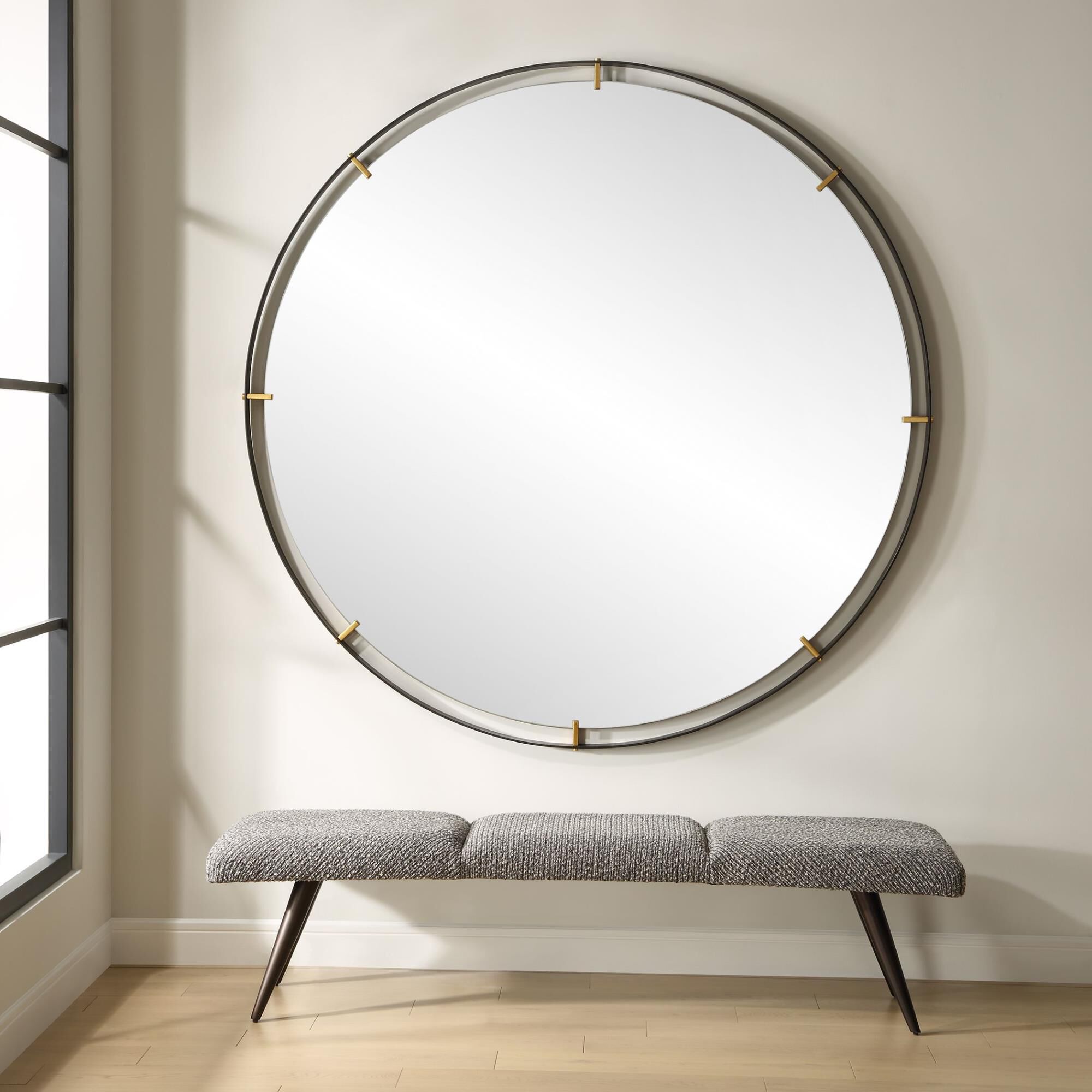 Shown in Elevate Your Home Decor With Our Grand Pendulum Round Mirror. Crafted With A Hefty Black Iron Frame  finish