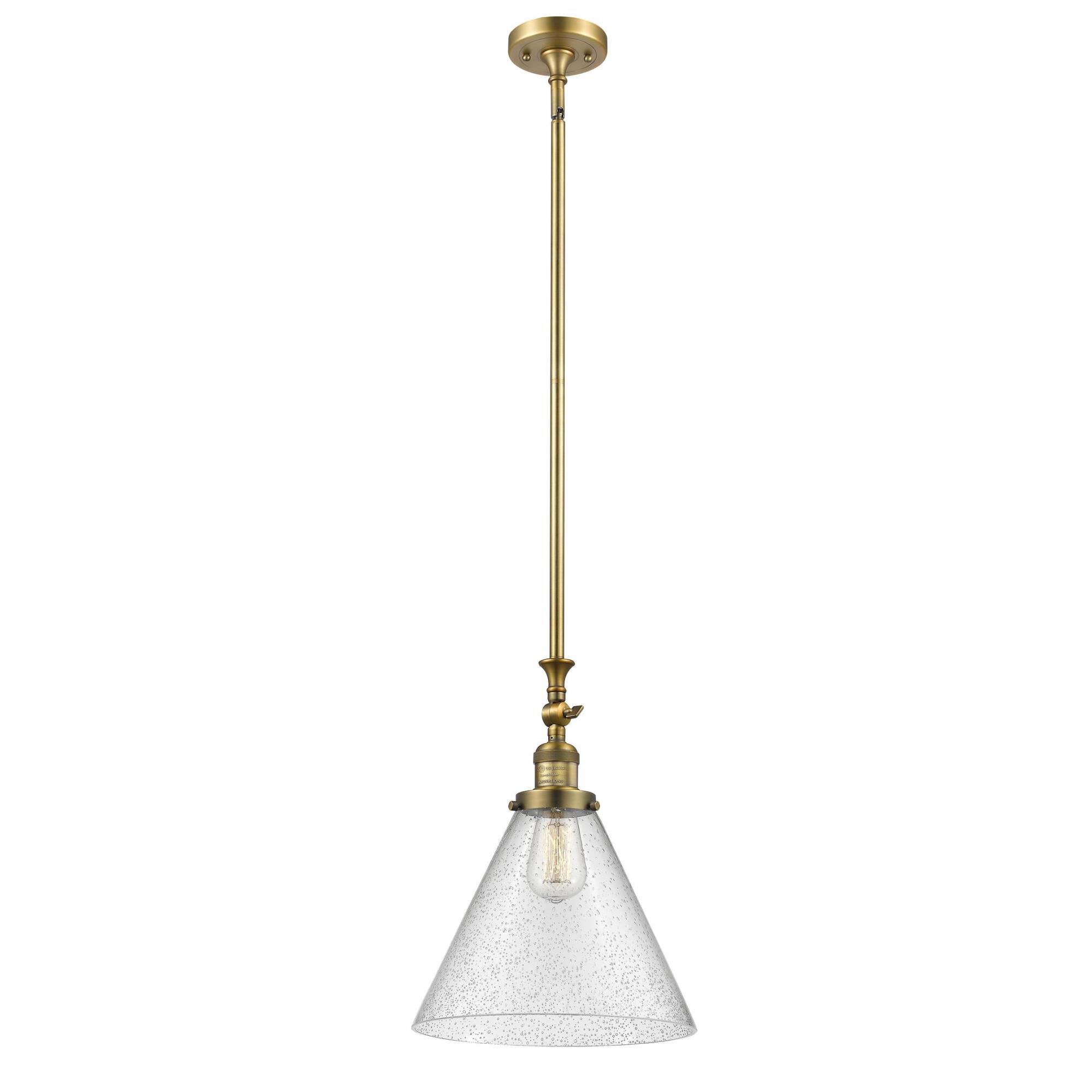 Shown in Brushed Brass finish and Seedy glass