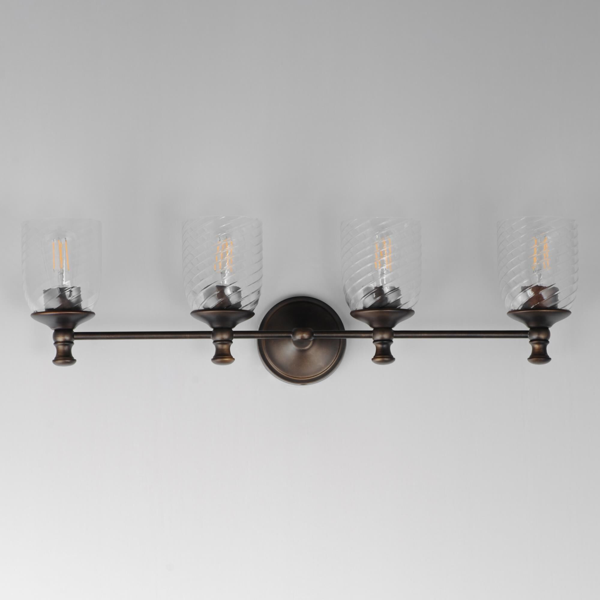 Shown in Antique Bronze finish and Clear Ribbed glass and Glass shade