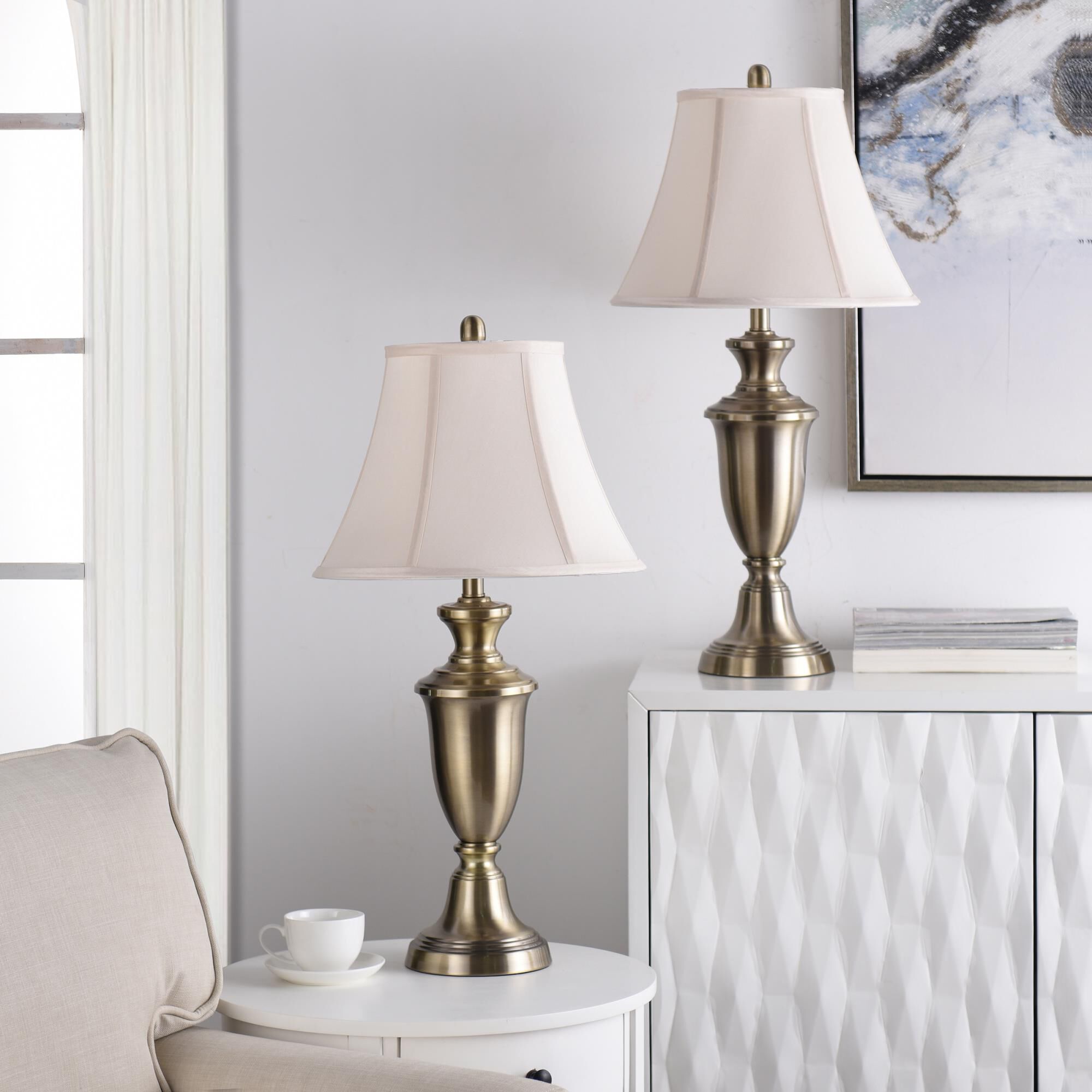 Shown in Antique Brass finish and White Softback Silk Fabric shade