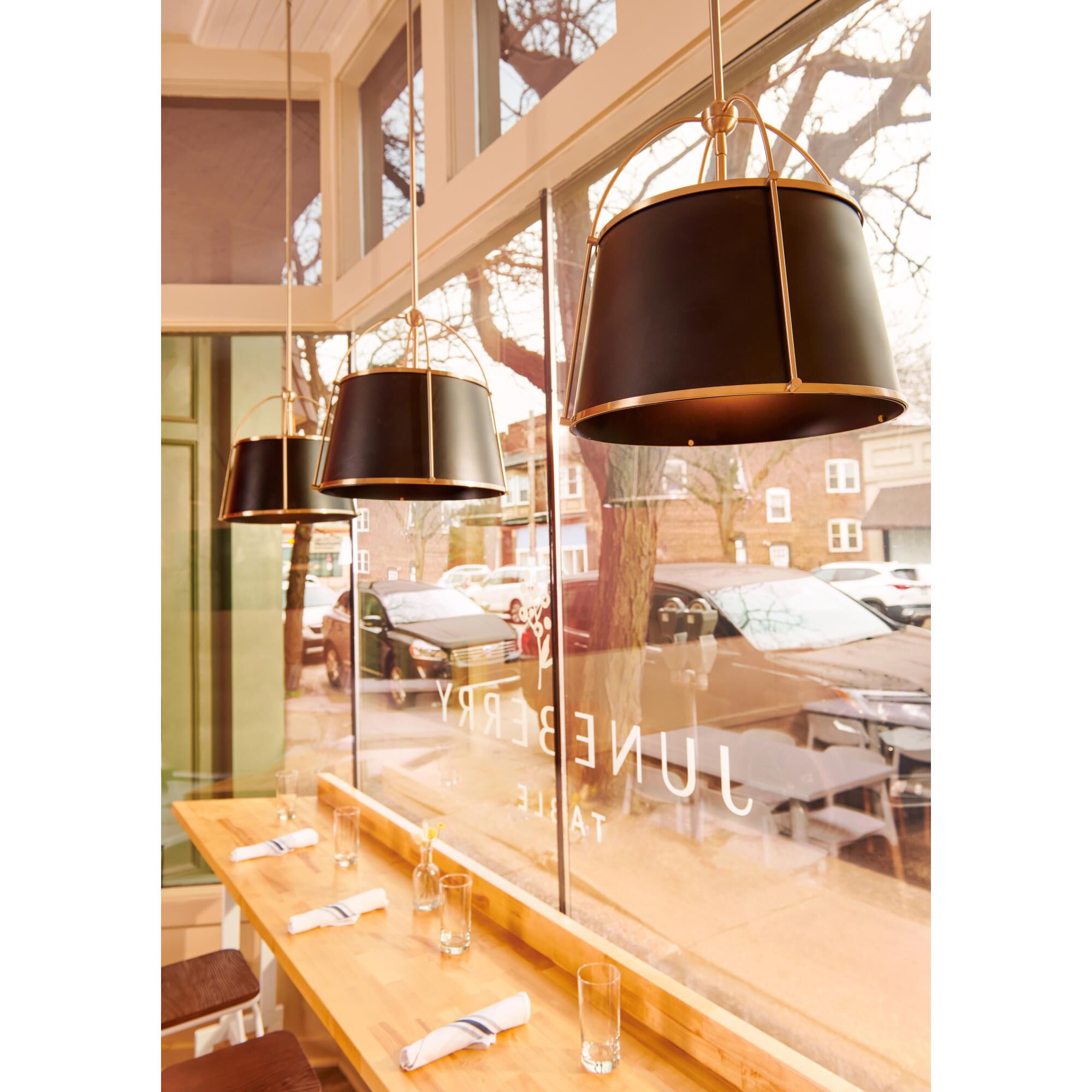 Shown in Lacquered Dark Brass finish and Metal shade