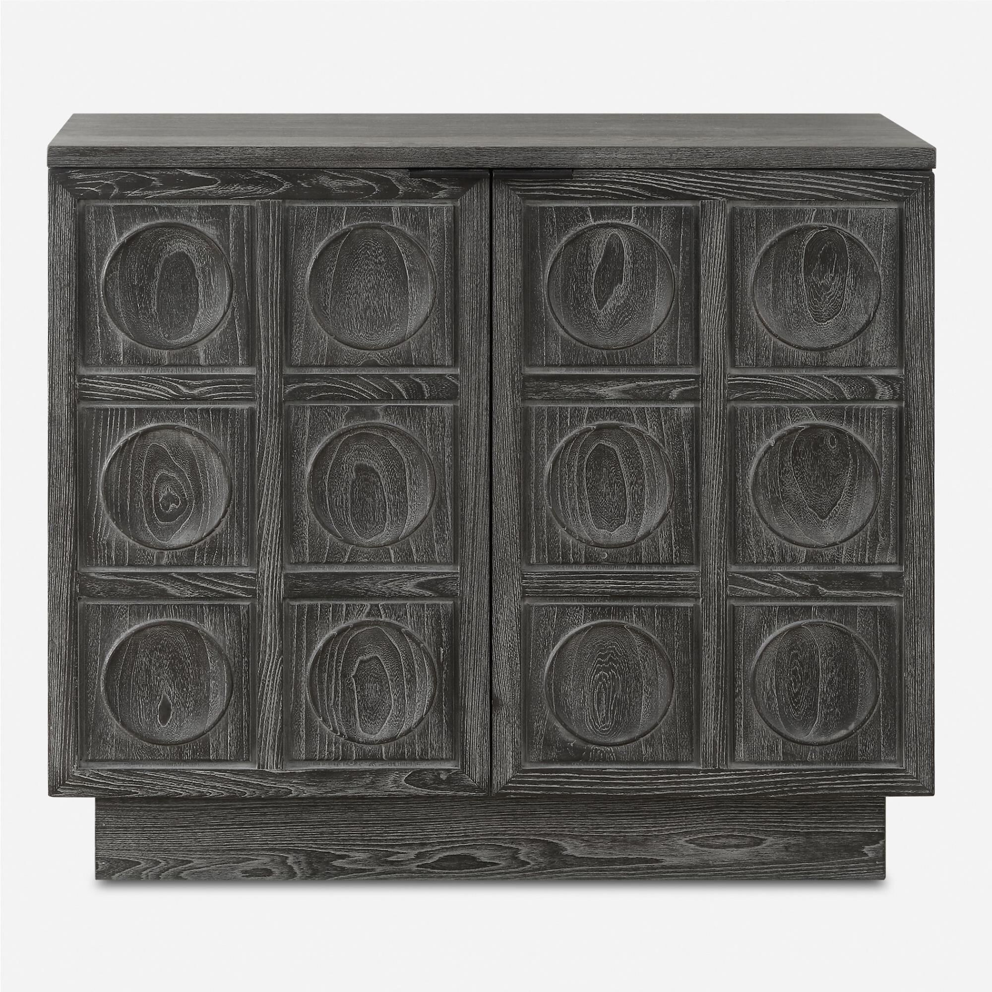 Shown in A Two Door Cabinet Featuring A Striking Carved Circular Design, Constructed From Solid Elm And Elm V finish