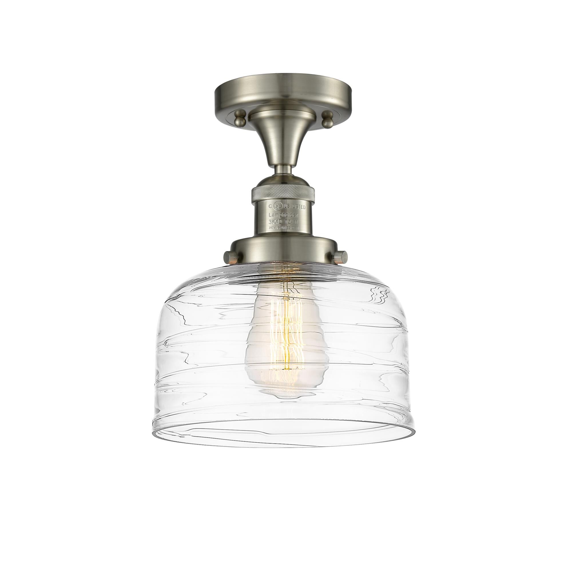 Shown in Brushed Satin Nickel finish and Clear Deco Swirl Large Bell glass