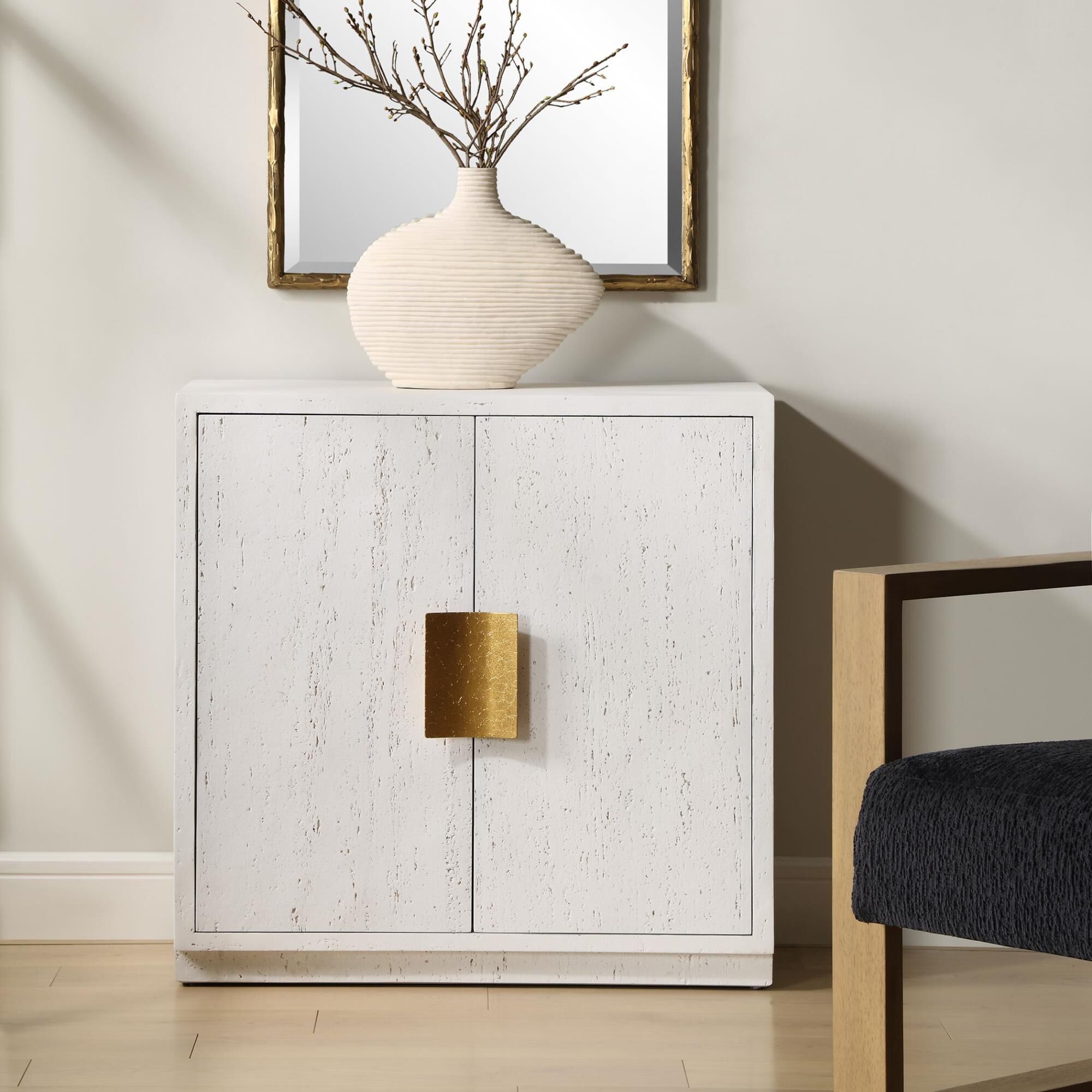 Shown in A Stylish Two Door Cabinet Crafted From Cast Resin. Emma Features A Porous Textured Surface For An O finish