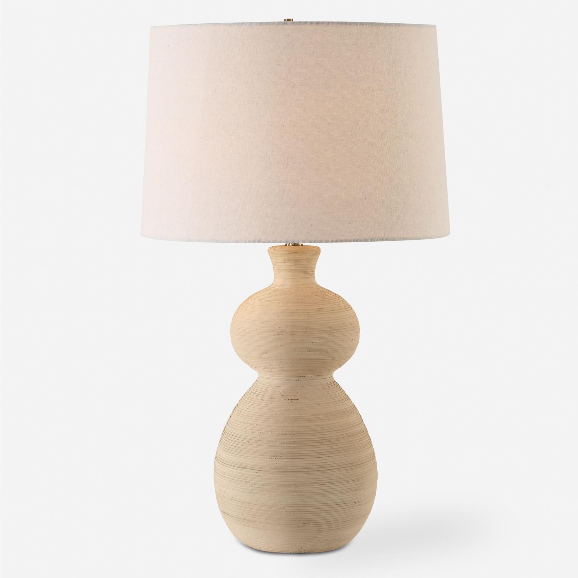 Shown in The Pueblo Table Lamp Combines The Rustic Beauty Of The Southwest With A Touch Of Timeless Elegance  finish and Round Hardback shade