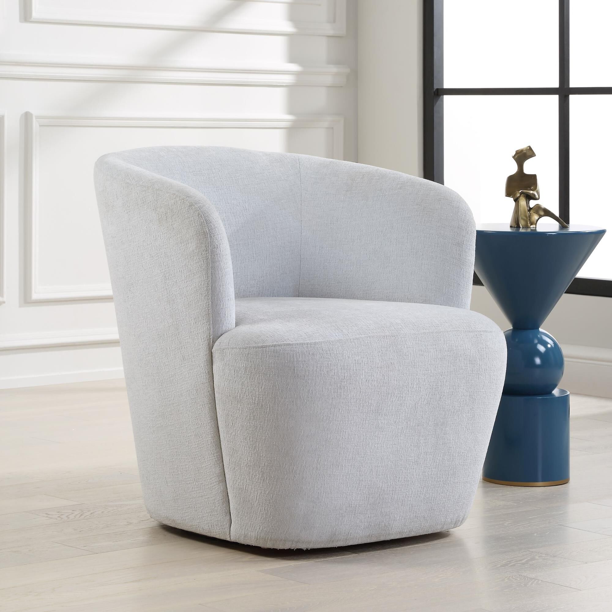 Shown in An Airy And Inviting Barrel Style Swivel Chair, Tailored In A Finely Textured, Cleanable Polyester W finish