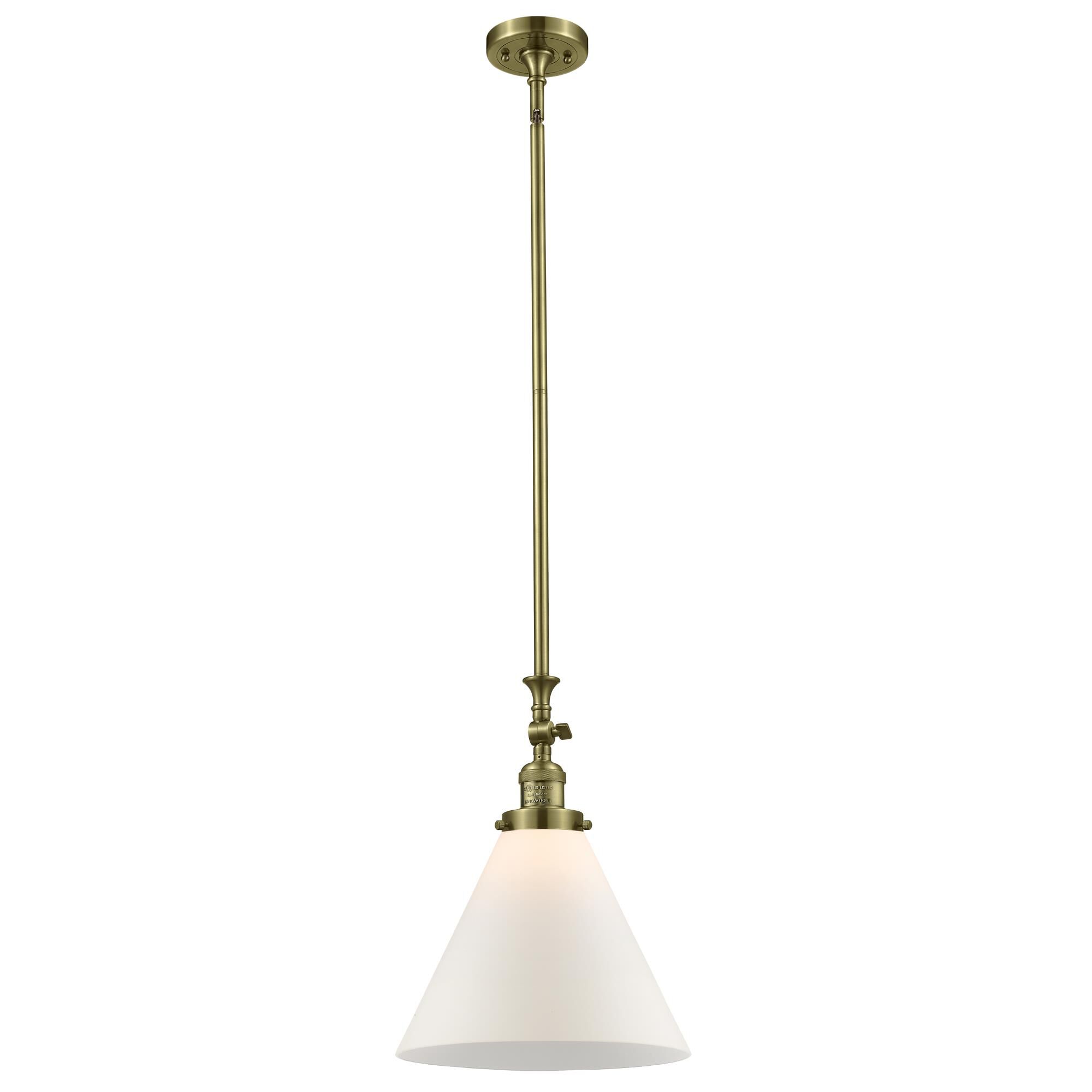 Shown in Antique Brass finish and Matte White Cased glass