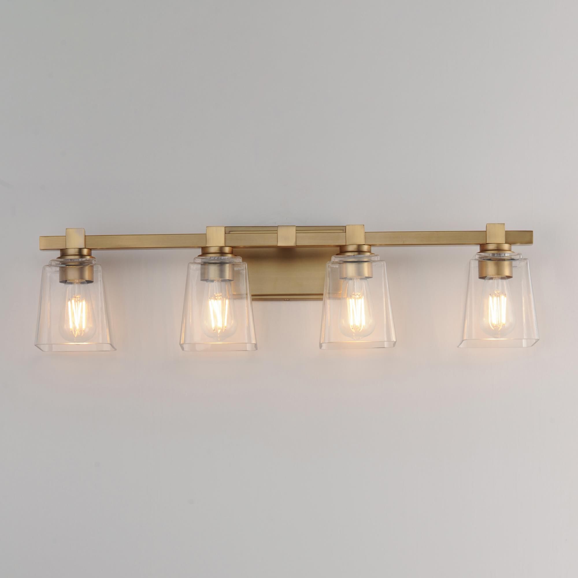 Shown in Natural Aged Brass finish and Clear glass and Glass shade