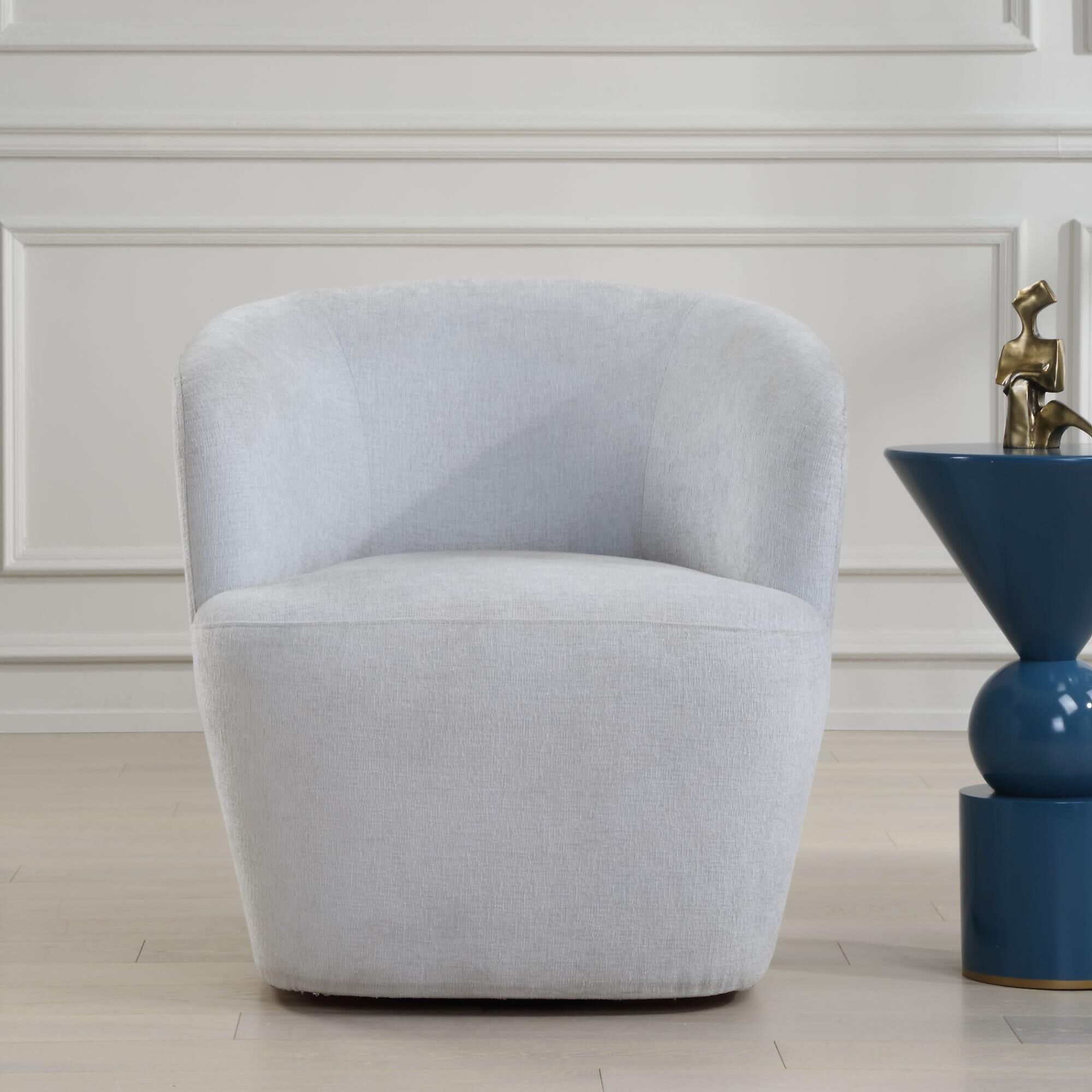 Shown in An Airy And Inviting Barrel Style Swivel Chair, Tailored In A Finely Textured, Cleanable Polyester W finish