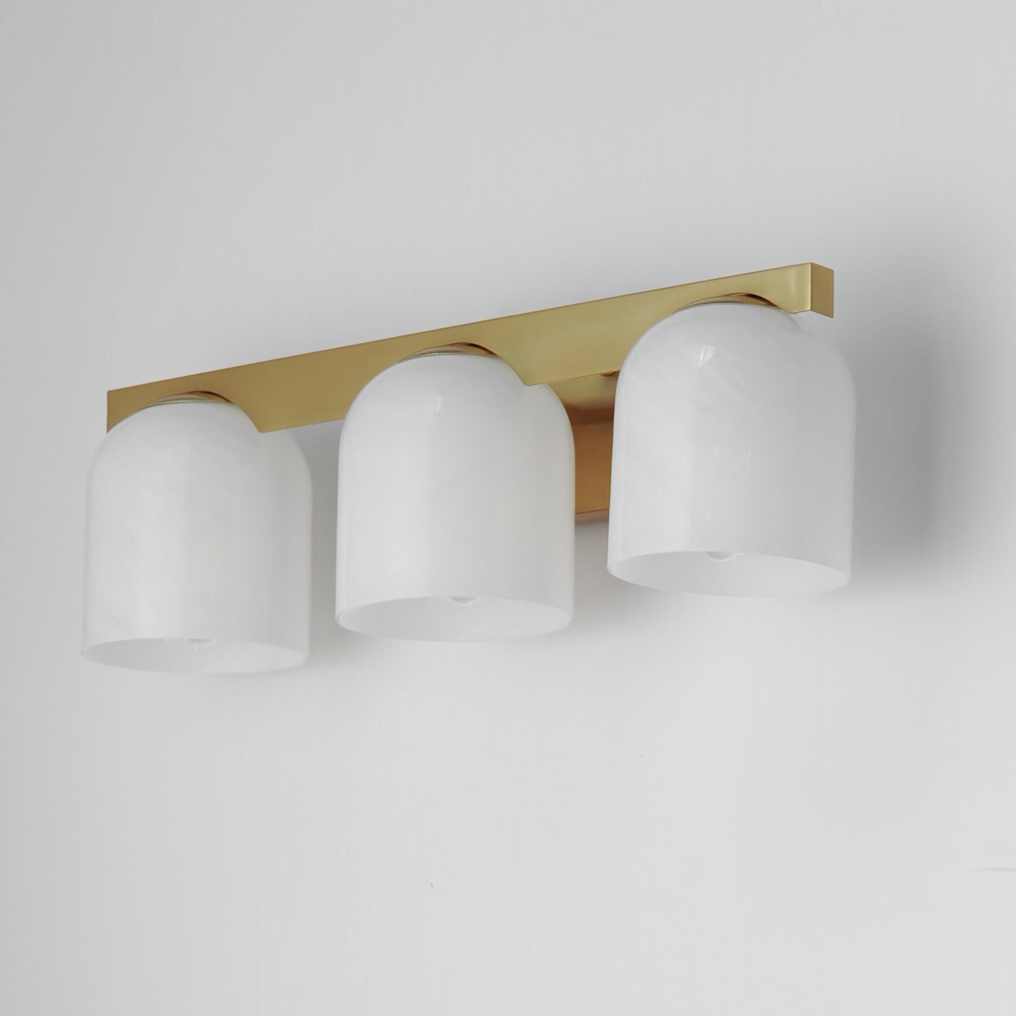 Shown in Natural Aged Brass finish and Marble glass and Glass shade