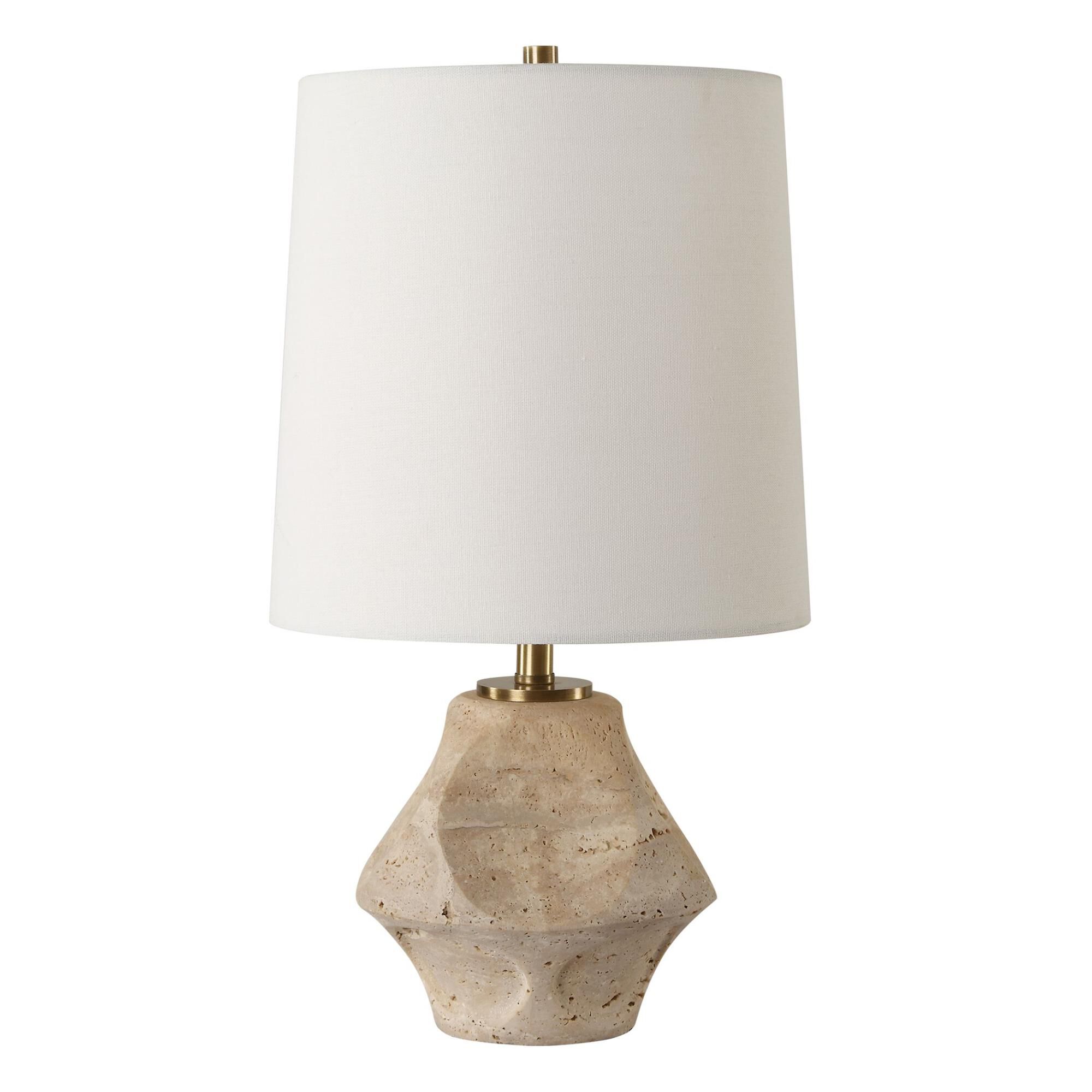 Shown in This Accent Lamp Features A Scooped Out Travertine Base Paired With Plated Antique Brass Accents. finish and Round Hardback shade