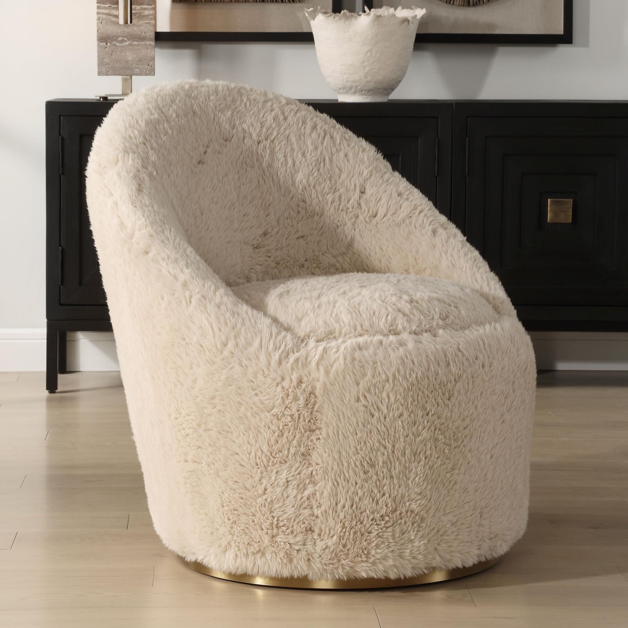 Shown in A Blend Of Contemporary And Cozy, This Chair Is Upholstered In A Caramel Toned Long-Haired Faux Shee finish