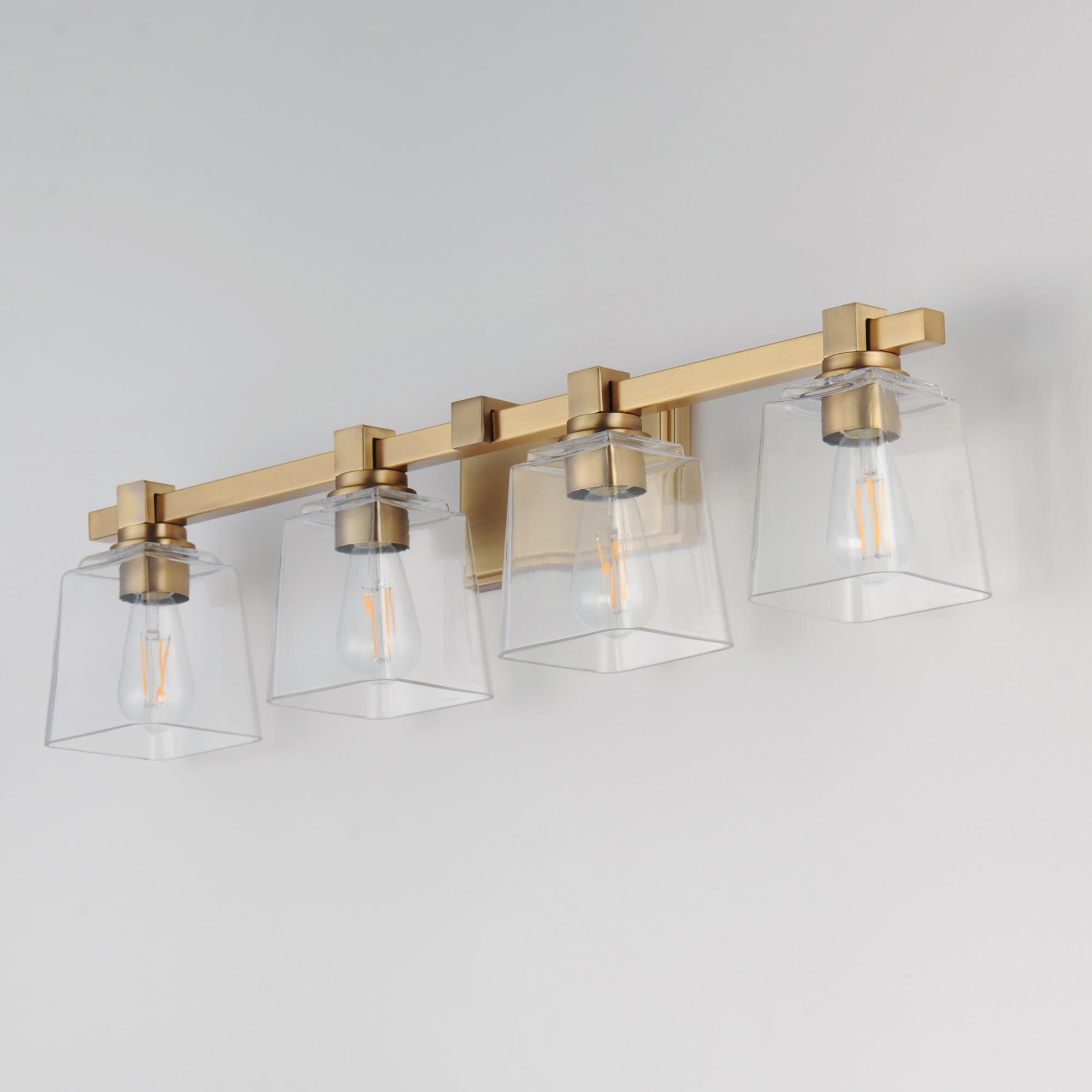 Shown in Natural Aged Brass finish and Clear glass and Glass shade