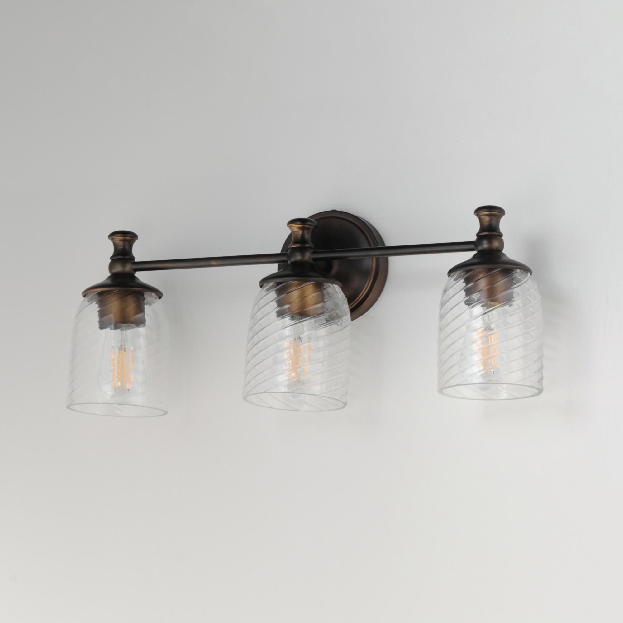 Shown in Antique Bronze finish and Clear Ribbed glass and Glass shade