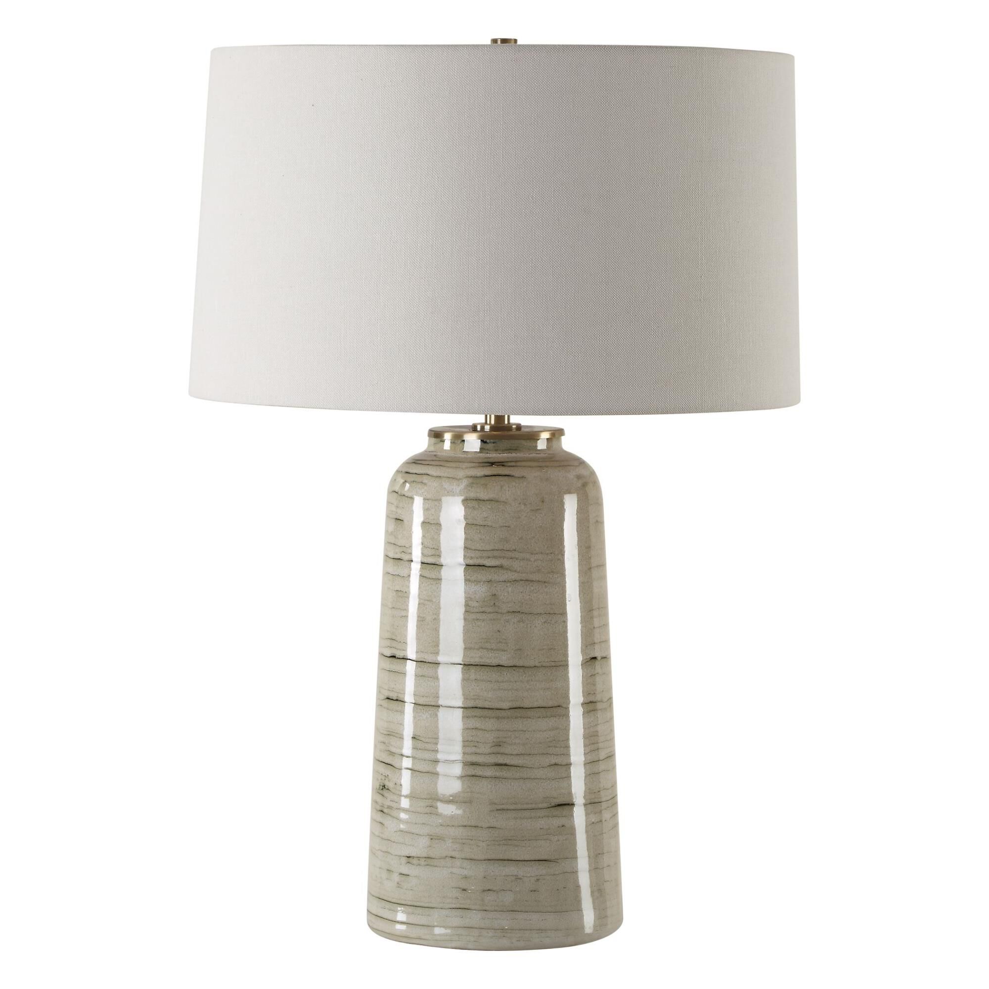 Shown in This Ceramic Table Lamp Features A Greenish Tan Glaze With Dark Undertones, Accented With Plated Ant finish and Round Hardback shade