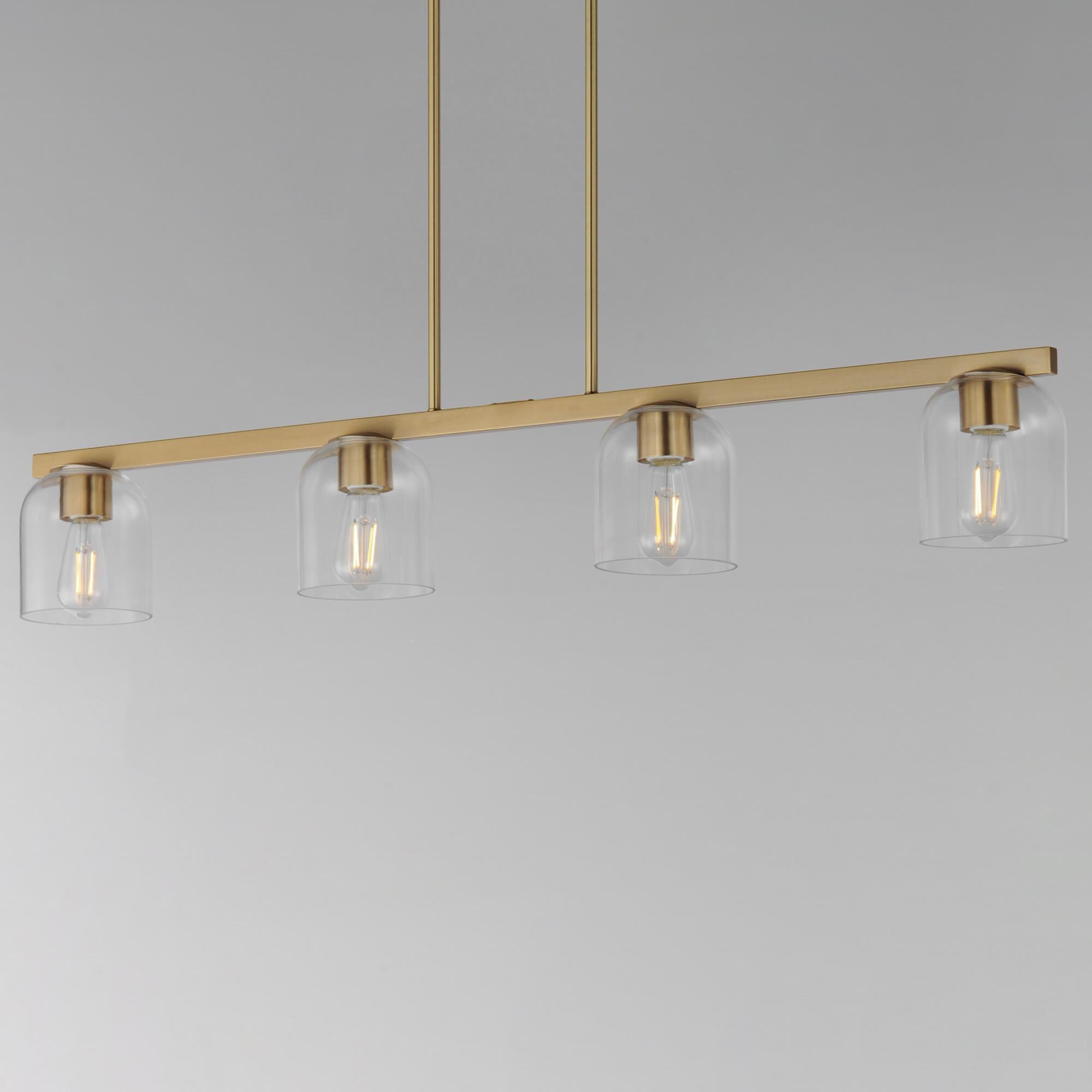 Shown in Natural Aged Brass finish and Clear glass and Glass shade