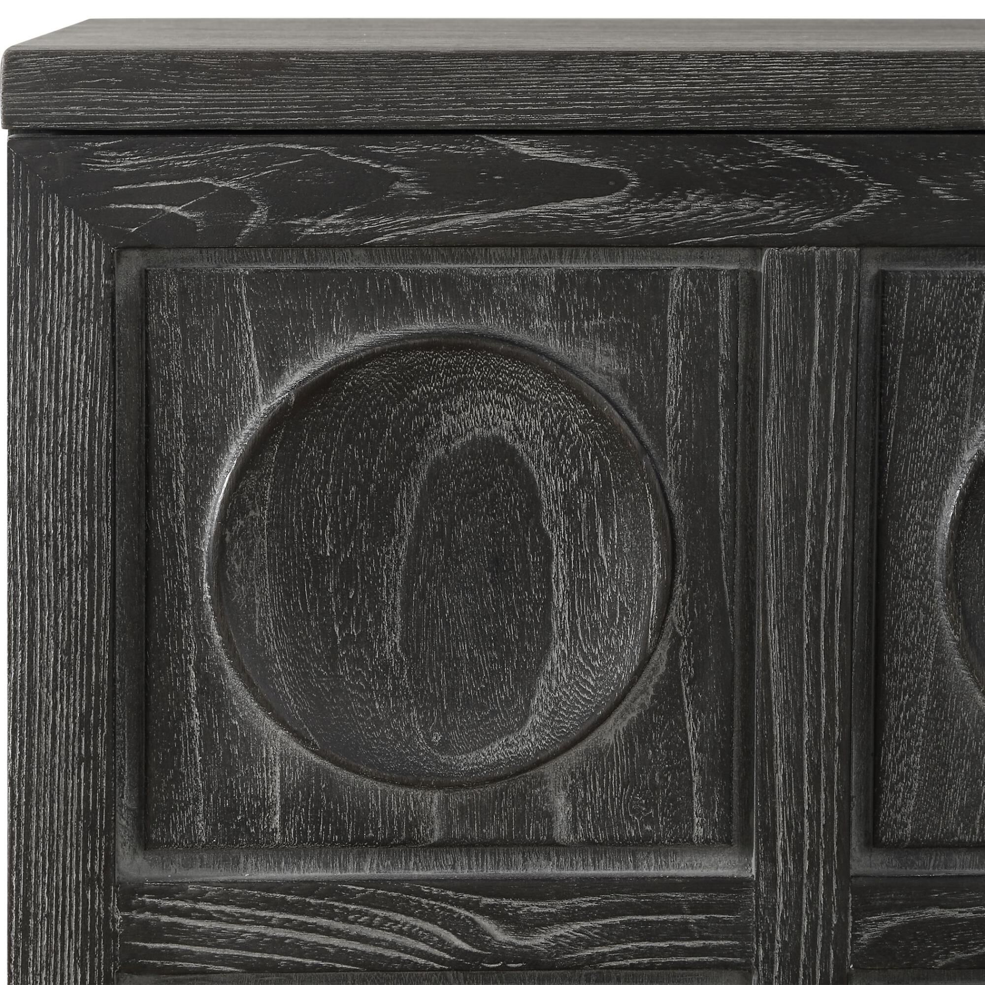 Shown in A Two Door Cabinet Featuring A Striking Carved Circular Design, Constructed From Solid Elm And Elm V finish