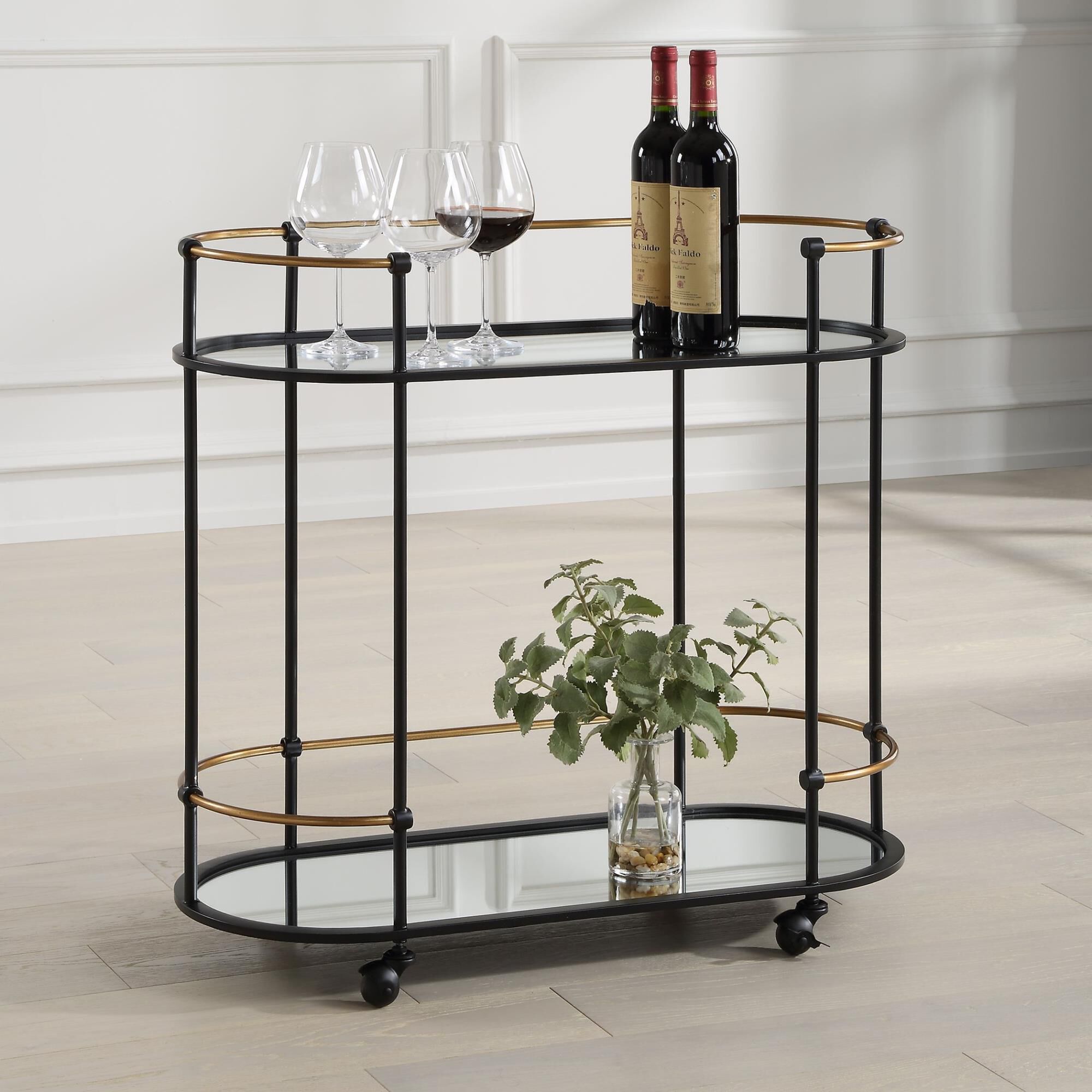 Shown in Highlighting A Clean Pill Shaped Design This Bar Cart Brags Of Satin Black Finished Iron Legs Accent finish