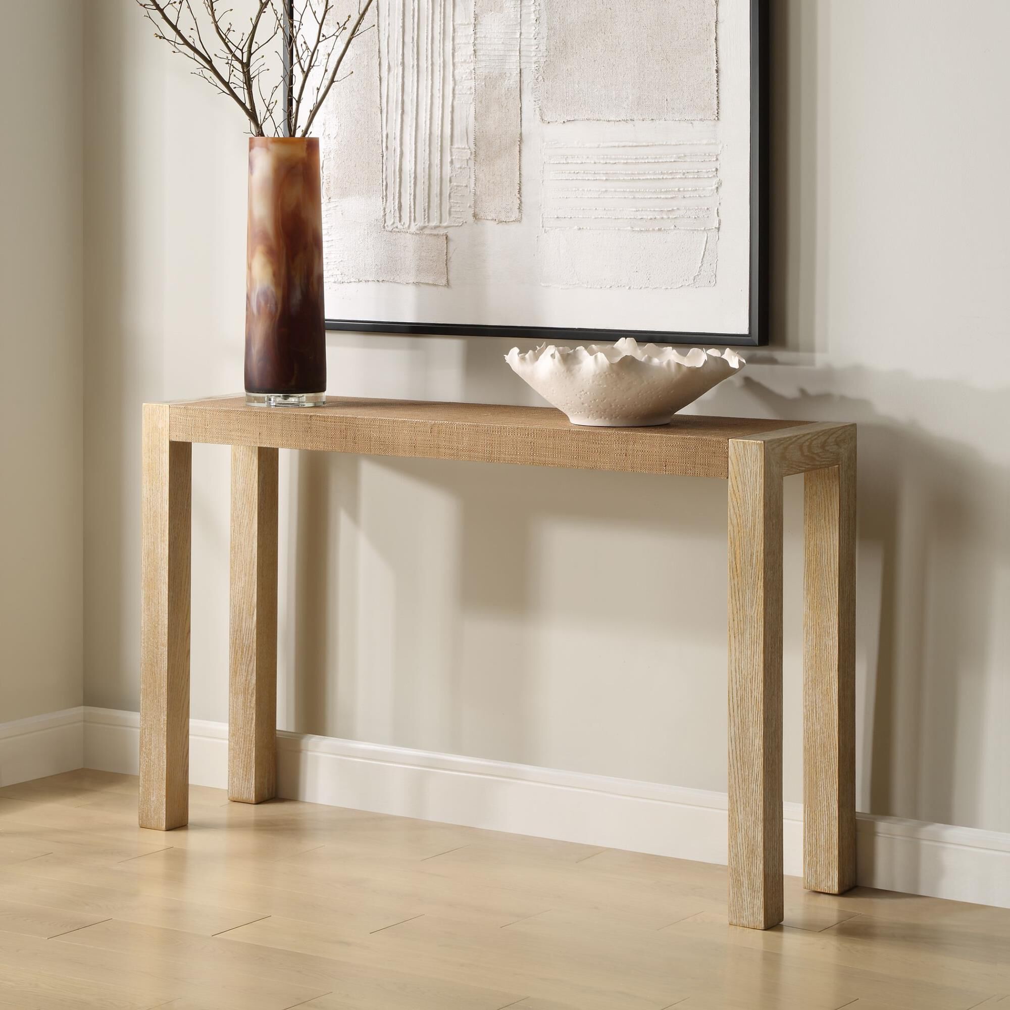 Shown in Organic And Breathtaking, The Bentley Console Table Is Composed Of A Textured Grasscloth Top And Com finish