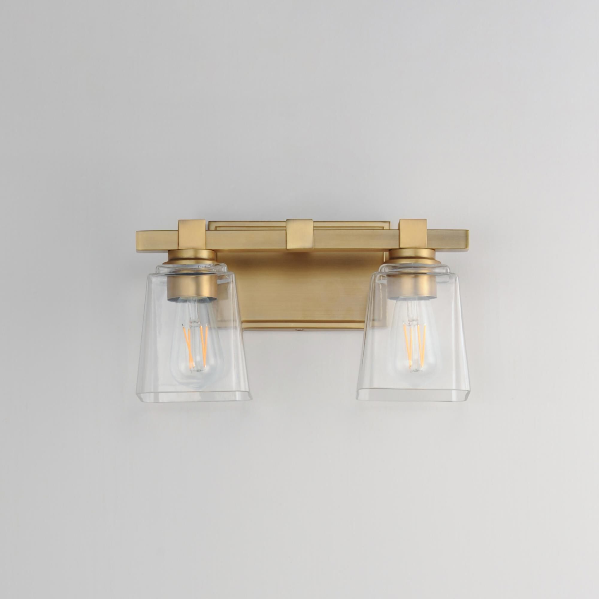 Shown in Natural Aged Brass finish and Clear glass and Glass shade