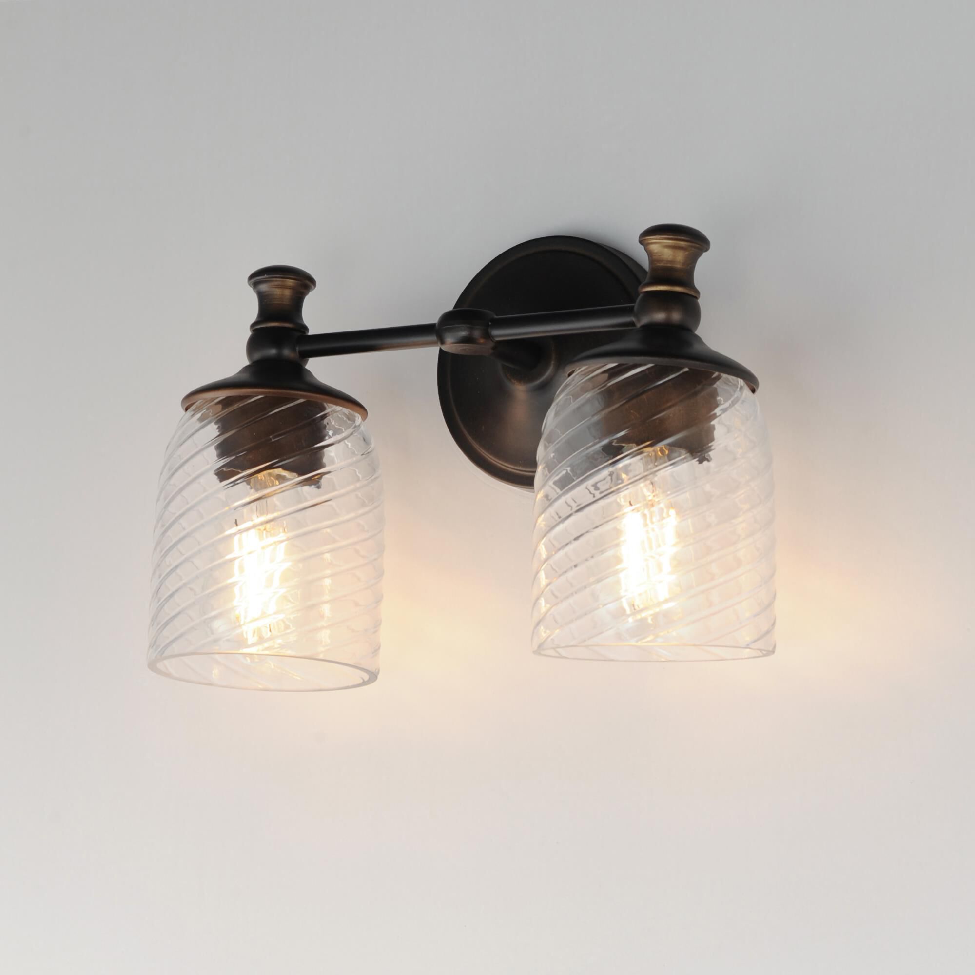 Shown in Antique Bronze finish and Clear Ribbed glass and Glass shade