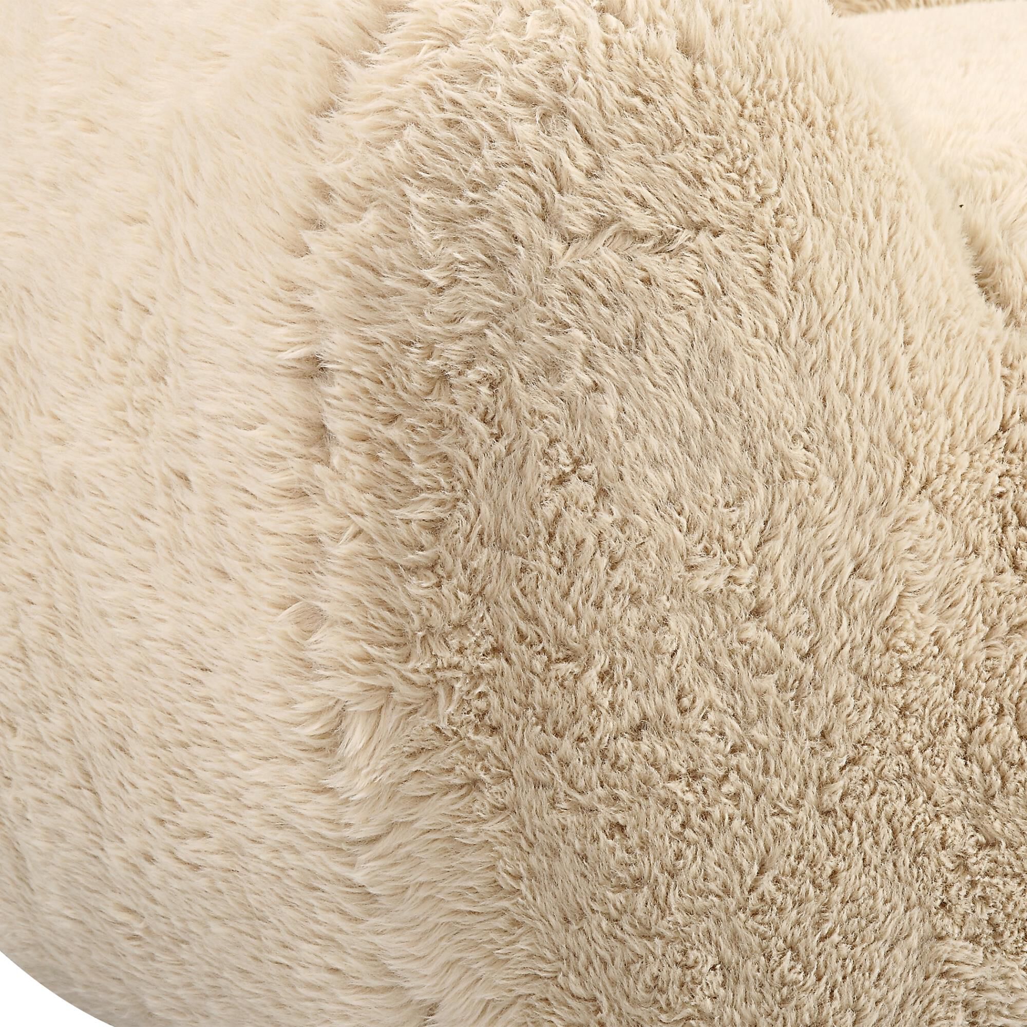 Shown in The Definition Of A Cozy Place To Rest, The Caramel Toned Long-Haired Faux Sheepskin Creates Rich Te finish