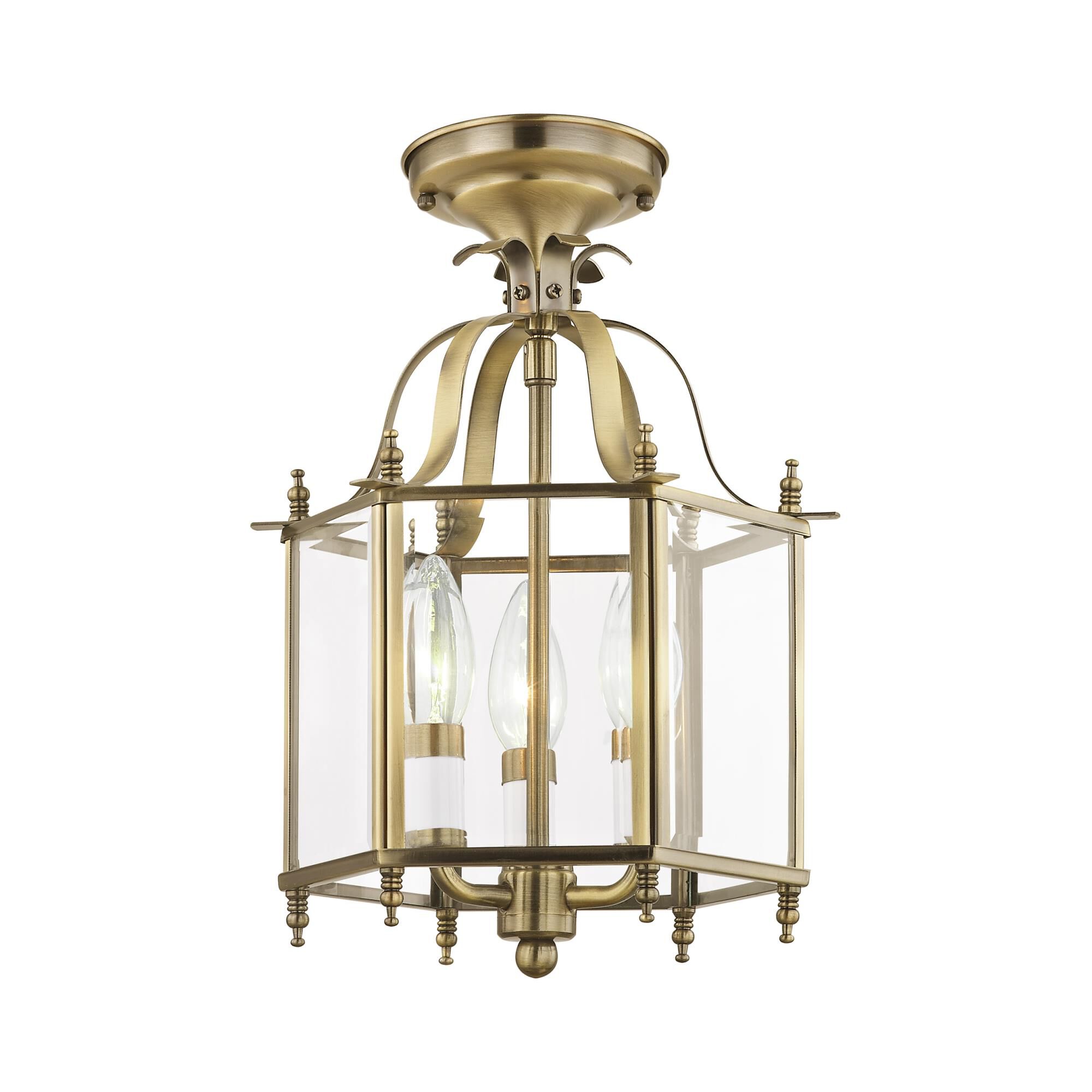 Shown in Antique Brass finish and Clear Beveled glass