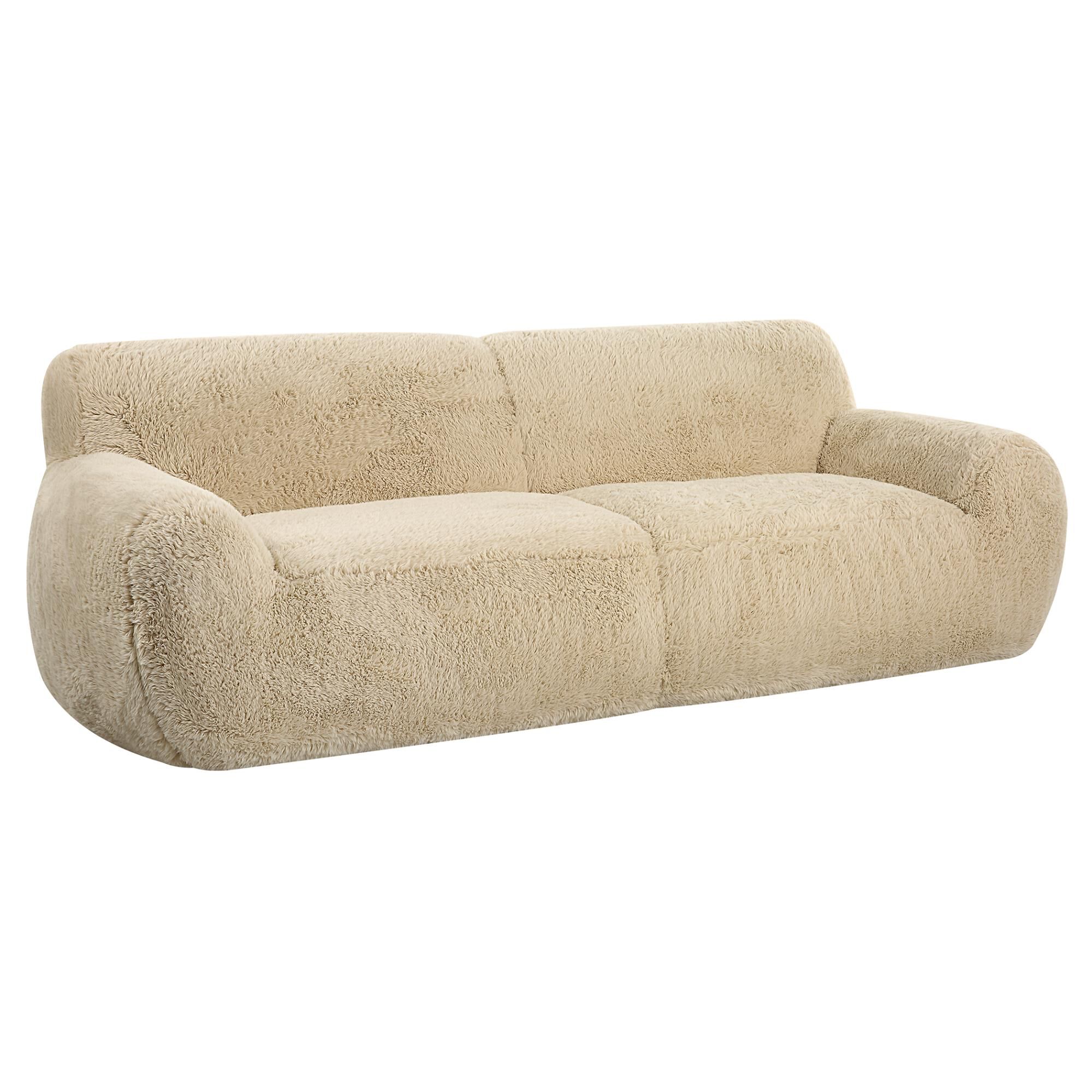 Shown in The Definition Of A Cozy Place To Rest, The Caramel Toned Long-Haired Faux Sheepskin Creates Rich Te finish