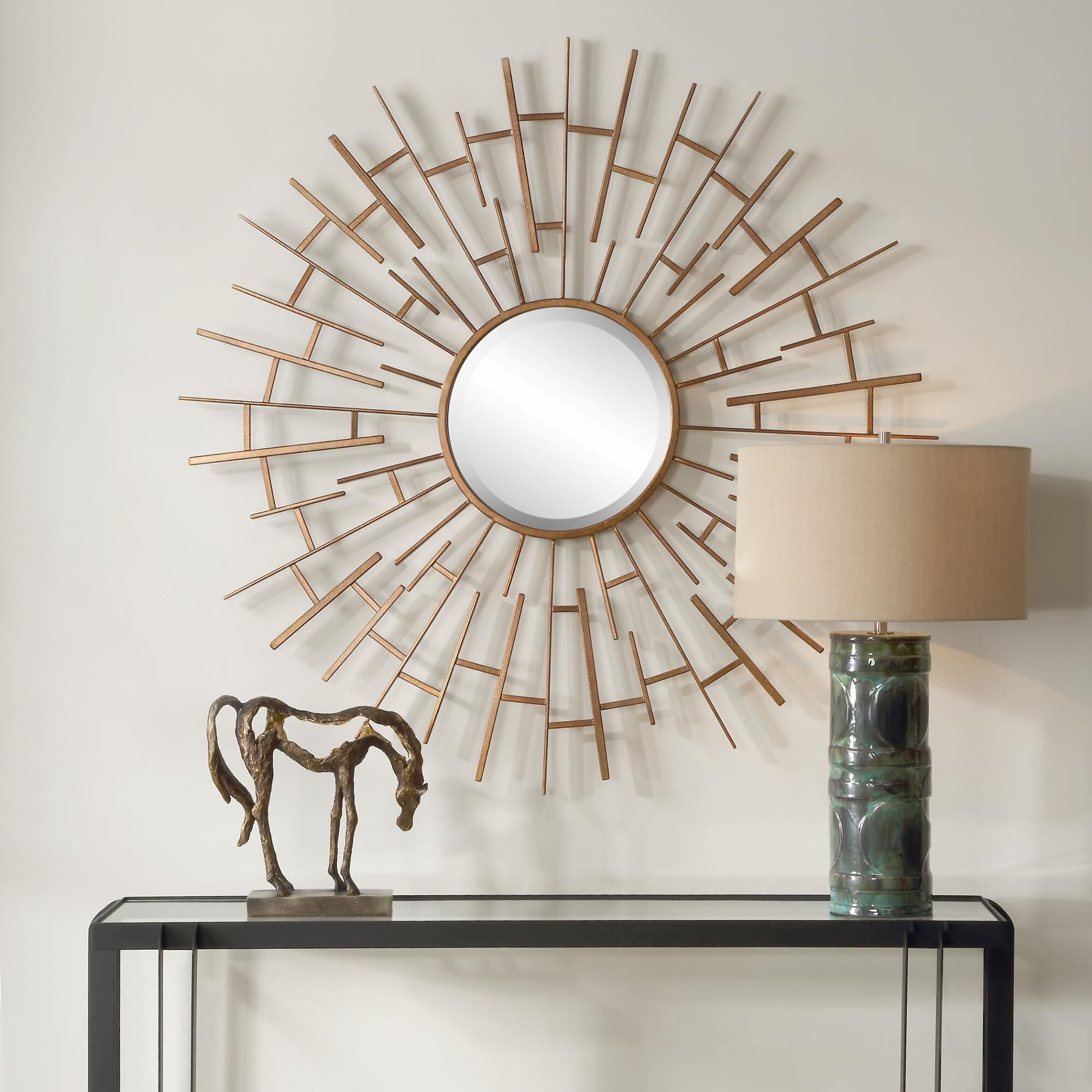 Shown in Framed By A Unique Maze Of Interlocking Iron Rods In Alternating Sizes, The Tangled Round Mirror Is  finish