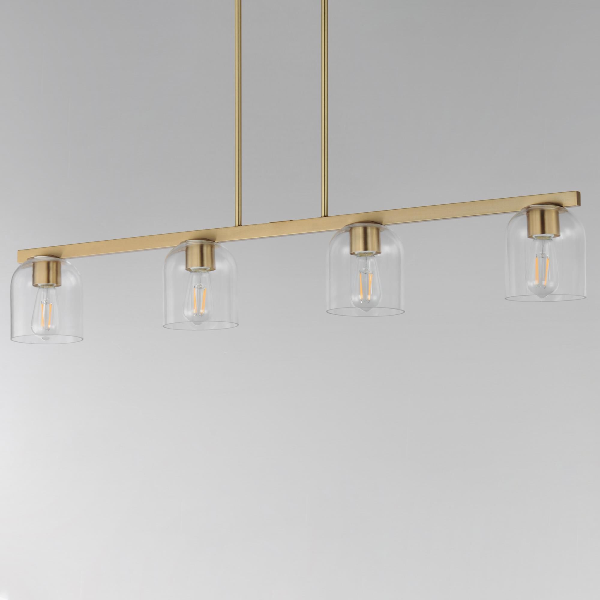 Shown in Natural Aged Brass finish and Clear glass and Glass shade