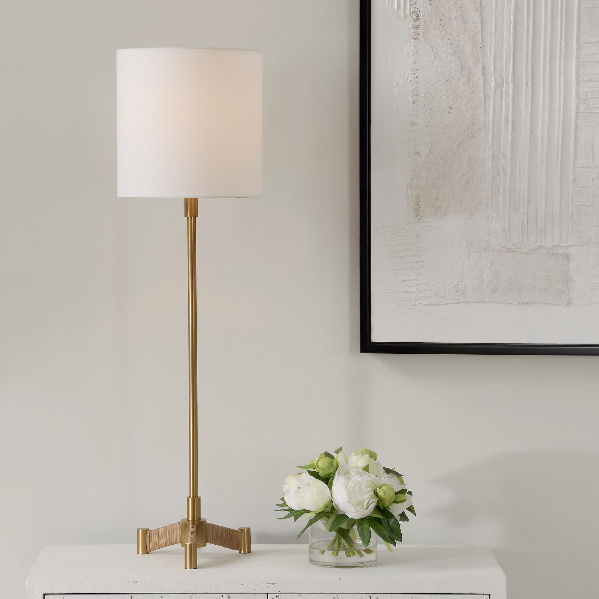 Shown in This Versatile Buffet Lamp Showcases A Plated Brass Slim Metal Base Accented By Rattan Wrapped Legs. finish and Round Hardback shade