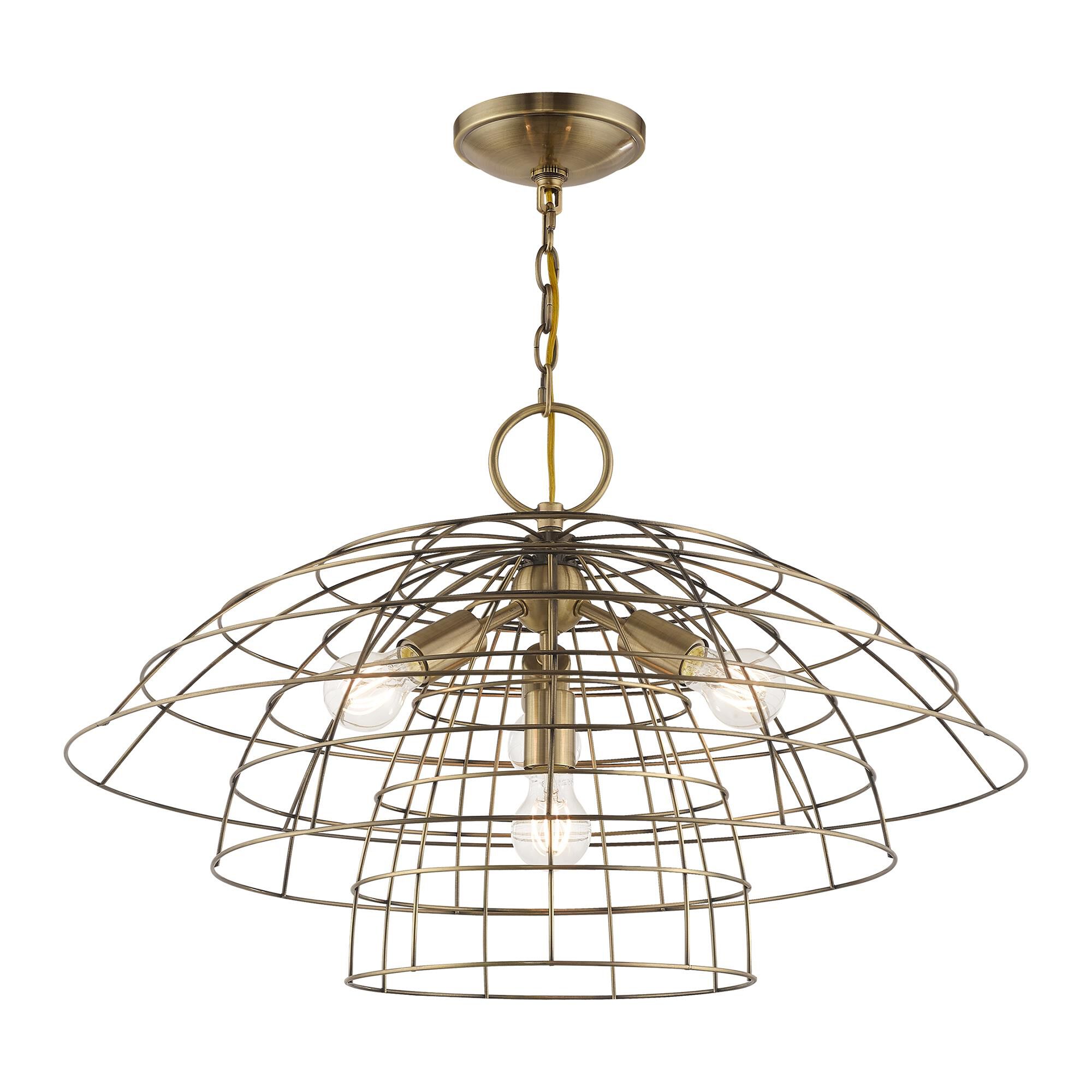 Shown in Antique Brass finish and Antique Brass Hand Crafted Steel Wire Cage shade