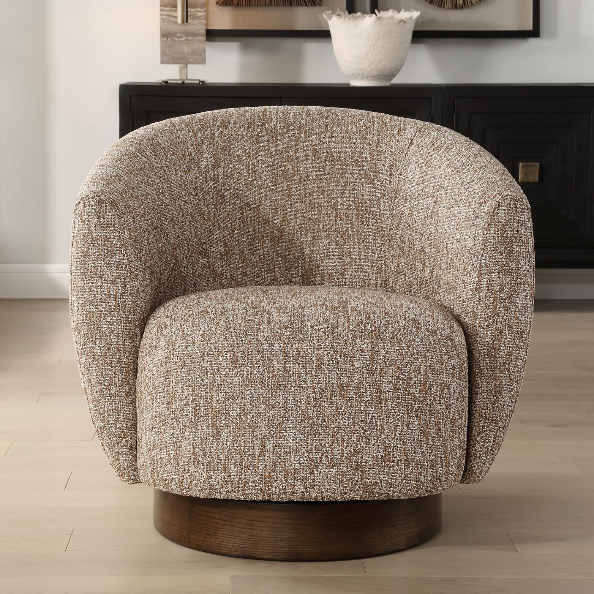 Shown in Embodying Richness Of Earth's Warm Tones, The Dunes Barrel Back Swivel Chair Features A Woven Fabric finish