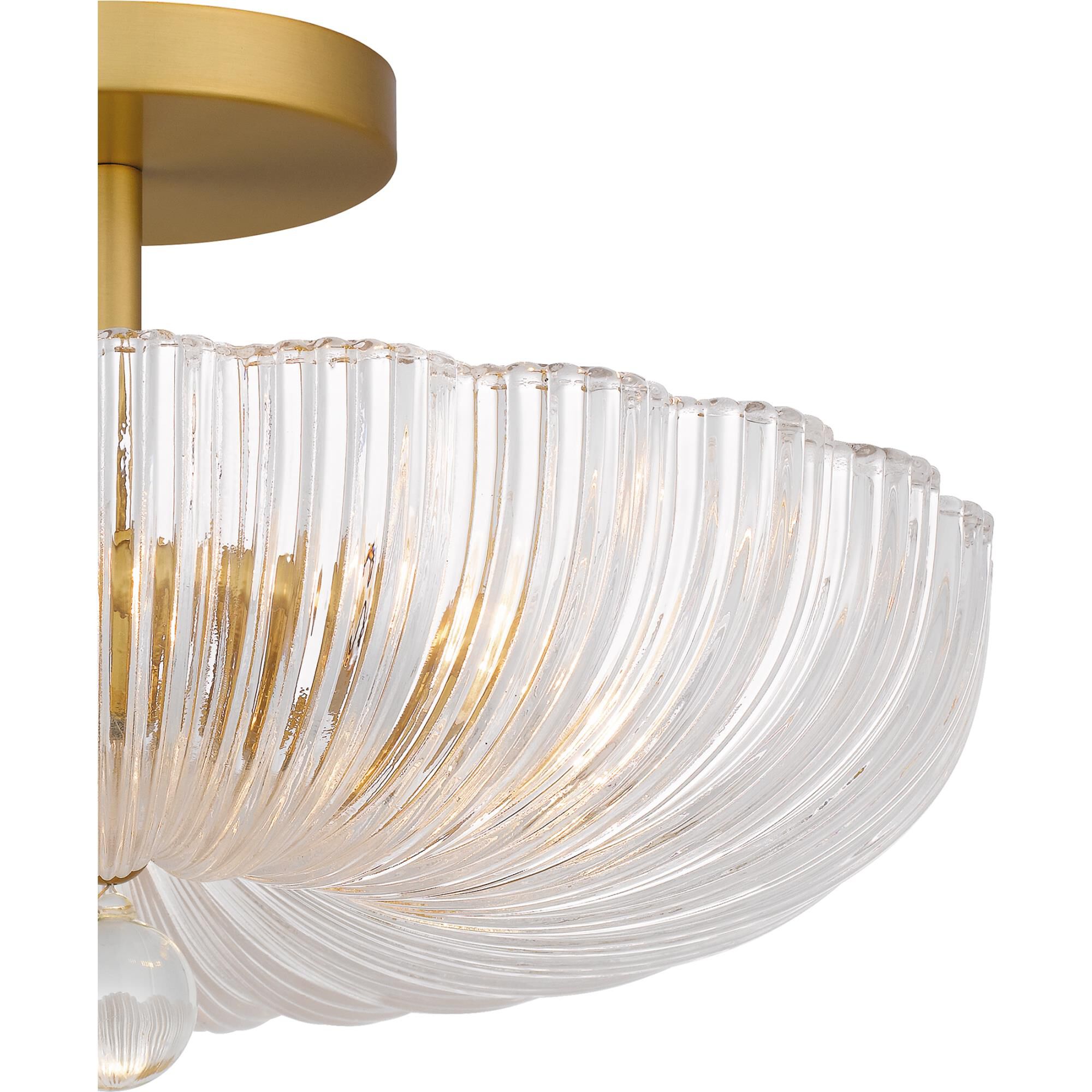 Shown in Brushed Gold finish and Clear Ribbed Glass shade