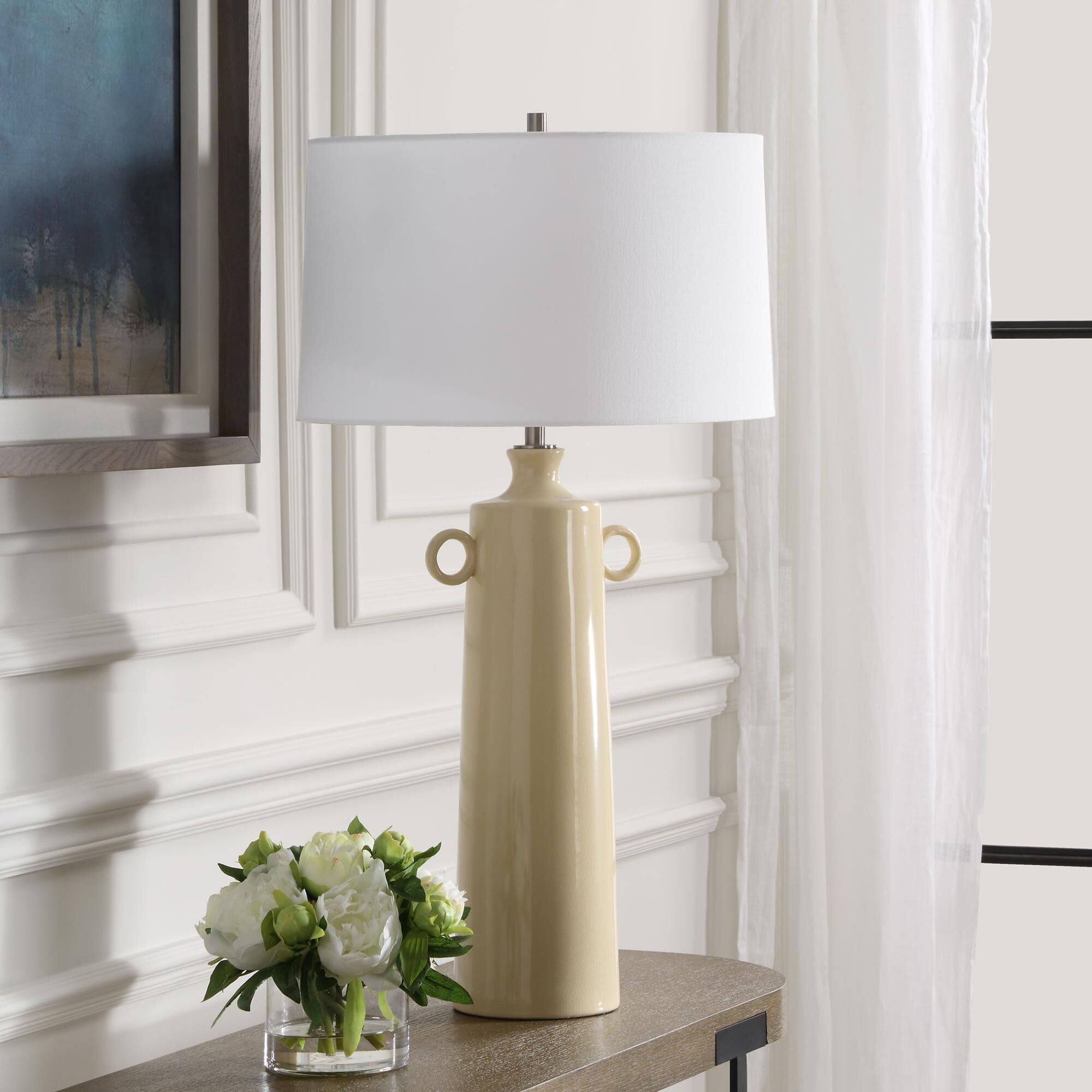 Shown in This Ceramic Lamp Boasts A Vase-Like Shaped Base In A Pale Yellow Crackled Glaze, Accented With Plat finish and Taper Drum Hardback shade