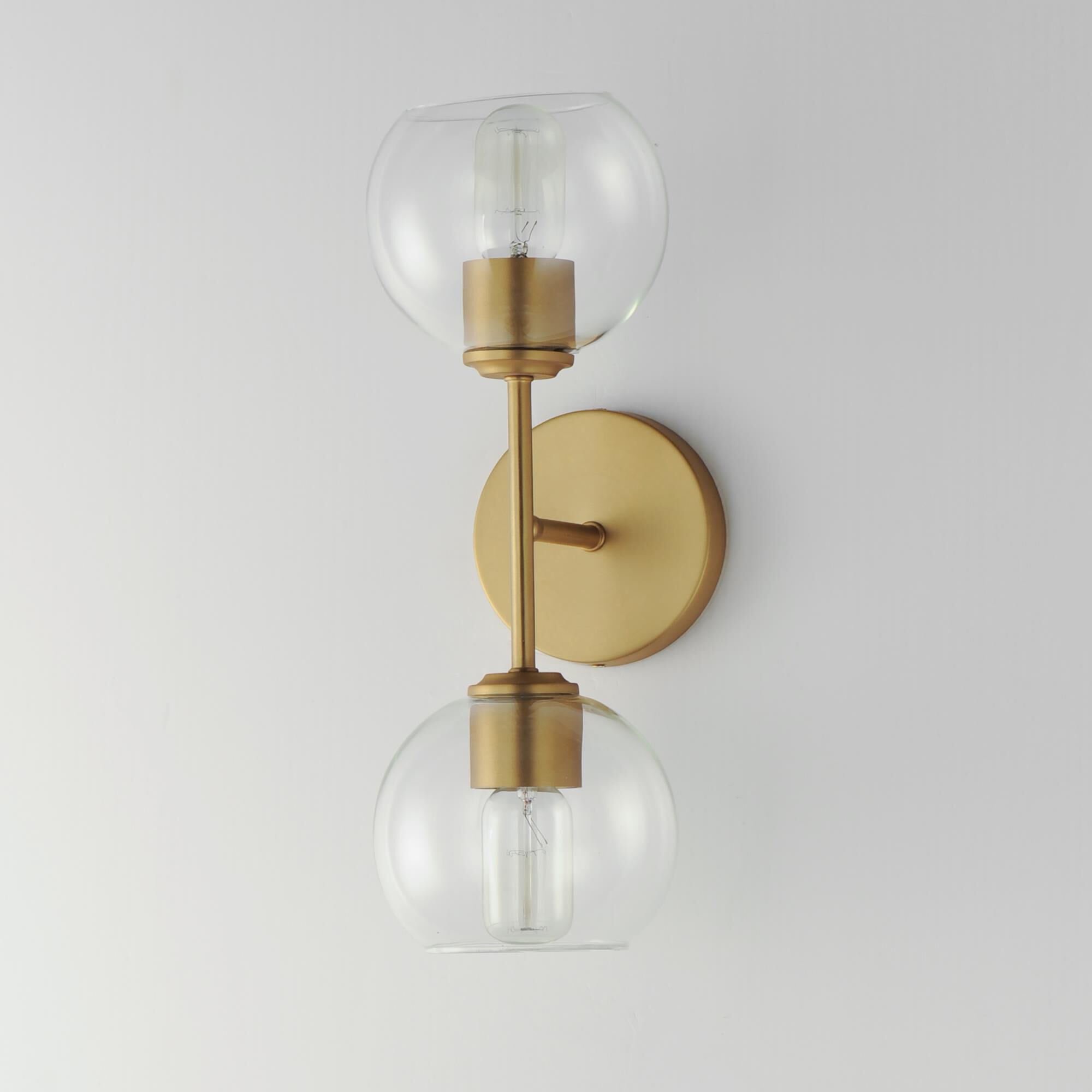 Shown in Natural Aged Brass finish and Clear glass and Glass shade