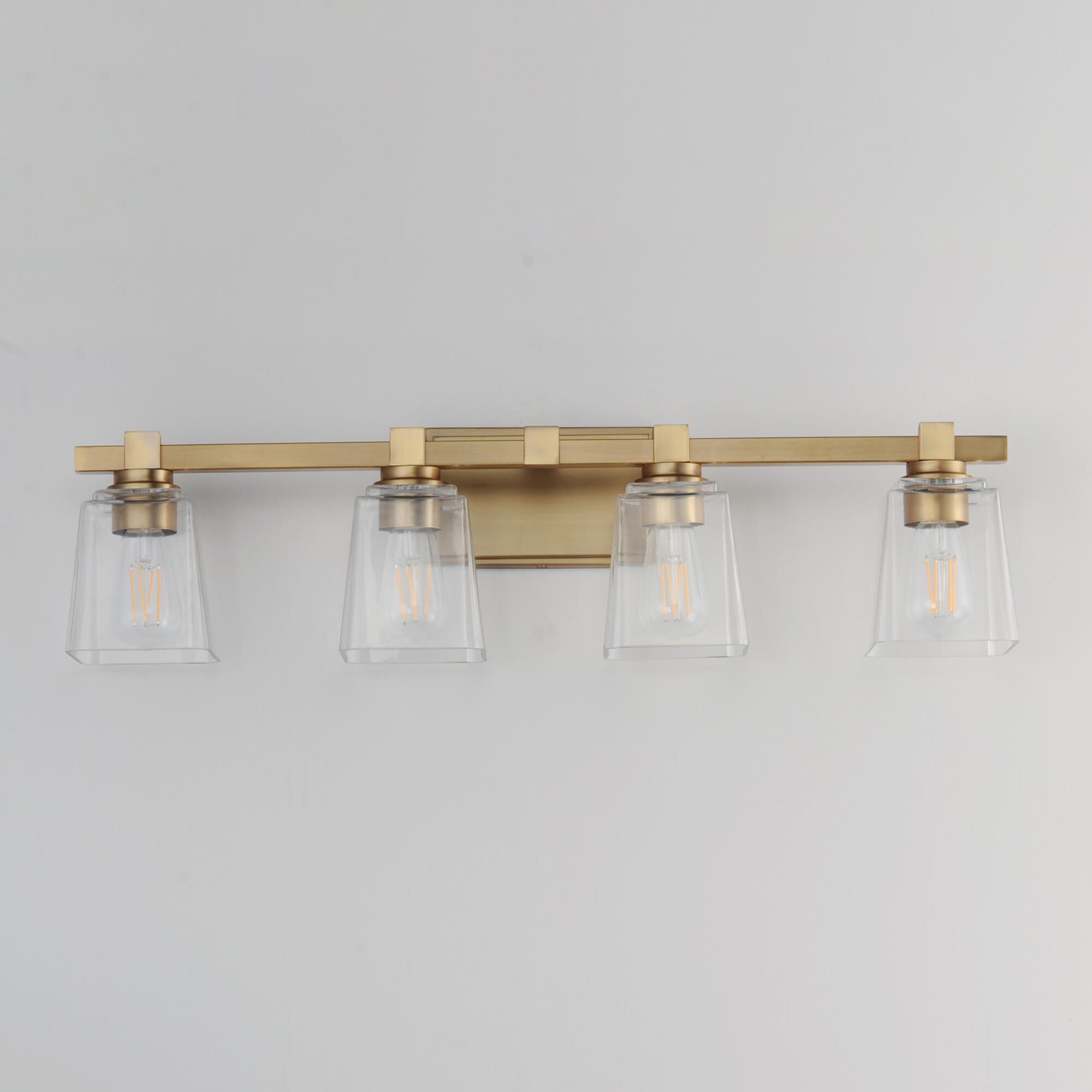 Shown in Natural Aged Brass finish and Clear glass and Glass shade