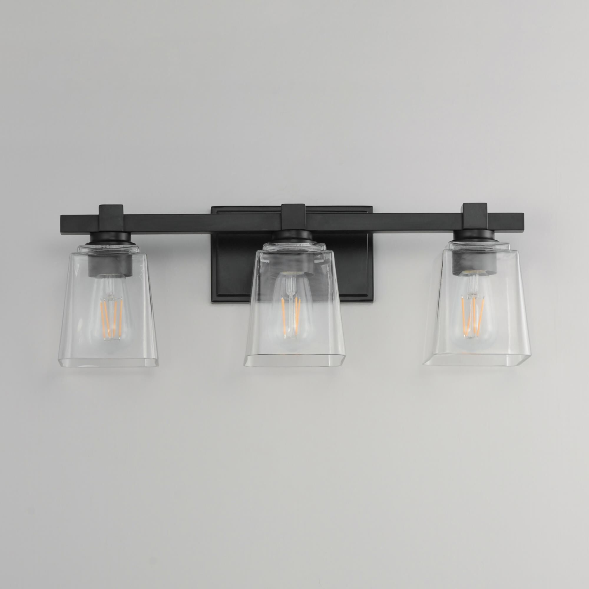 Shown in Black finish and Clear glass and Glass shade