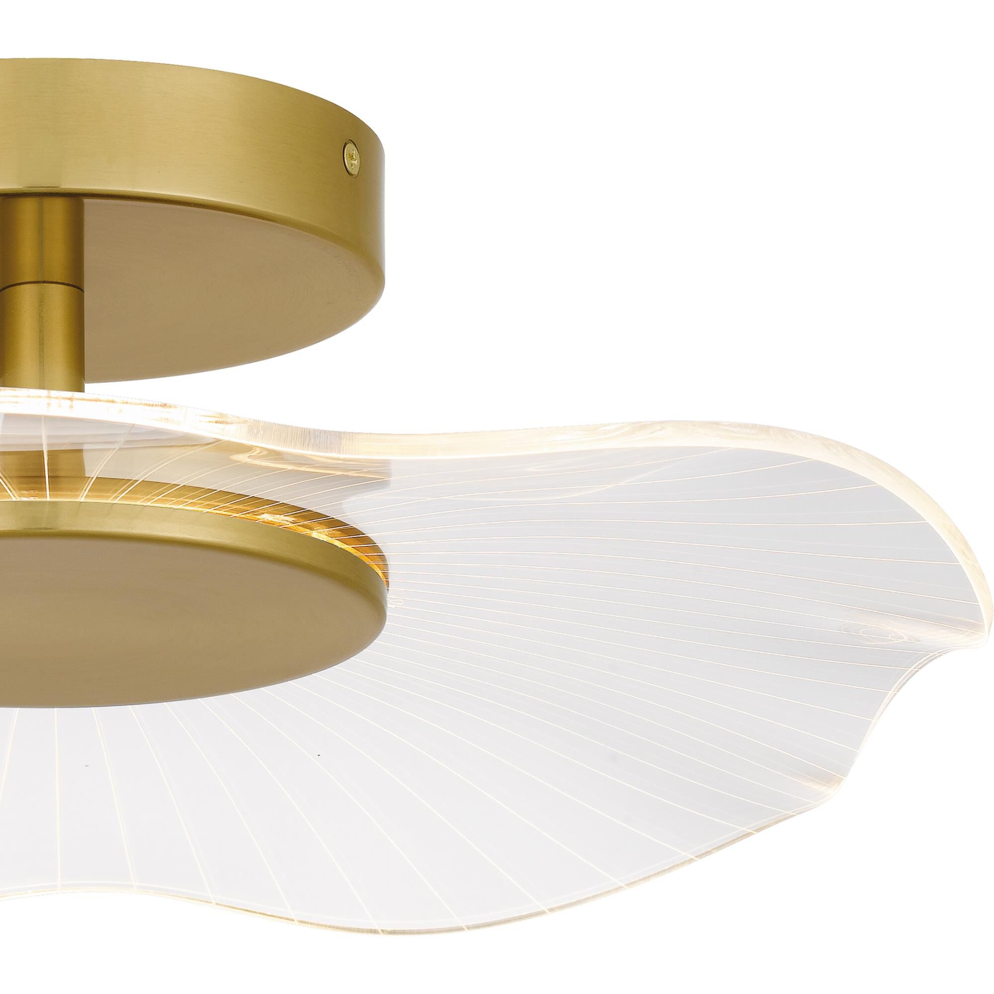 Shown in Brushed Gold finish and Clear Acrylic shade