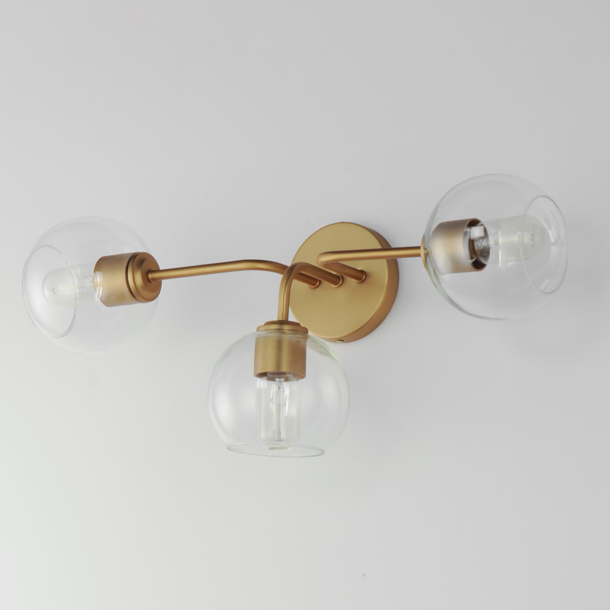 Shown in Natural Aged Brass finish and Clear glass and Glass shade