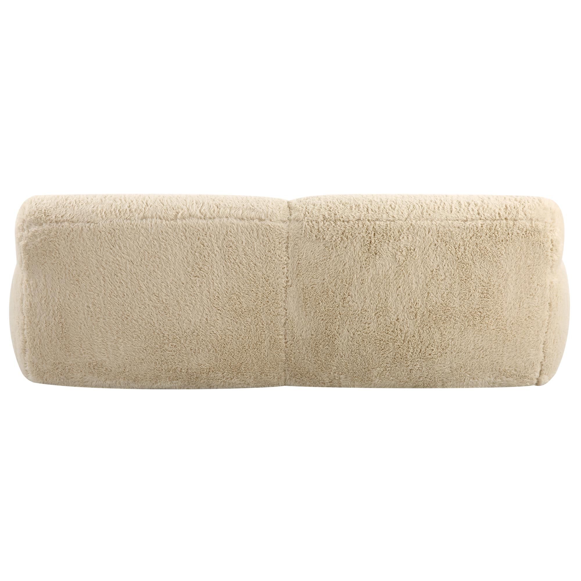 Shown in The Definition Of A Cozy Place To Rest, The Caramel Toned Long-Haired Faux Sheepskin Creates Rich Te finish