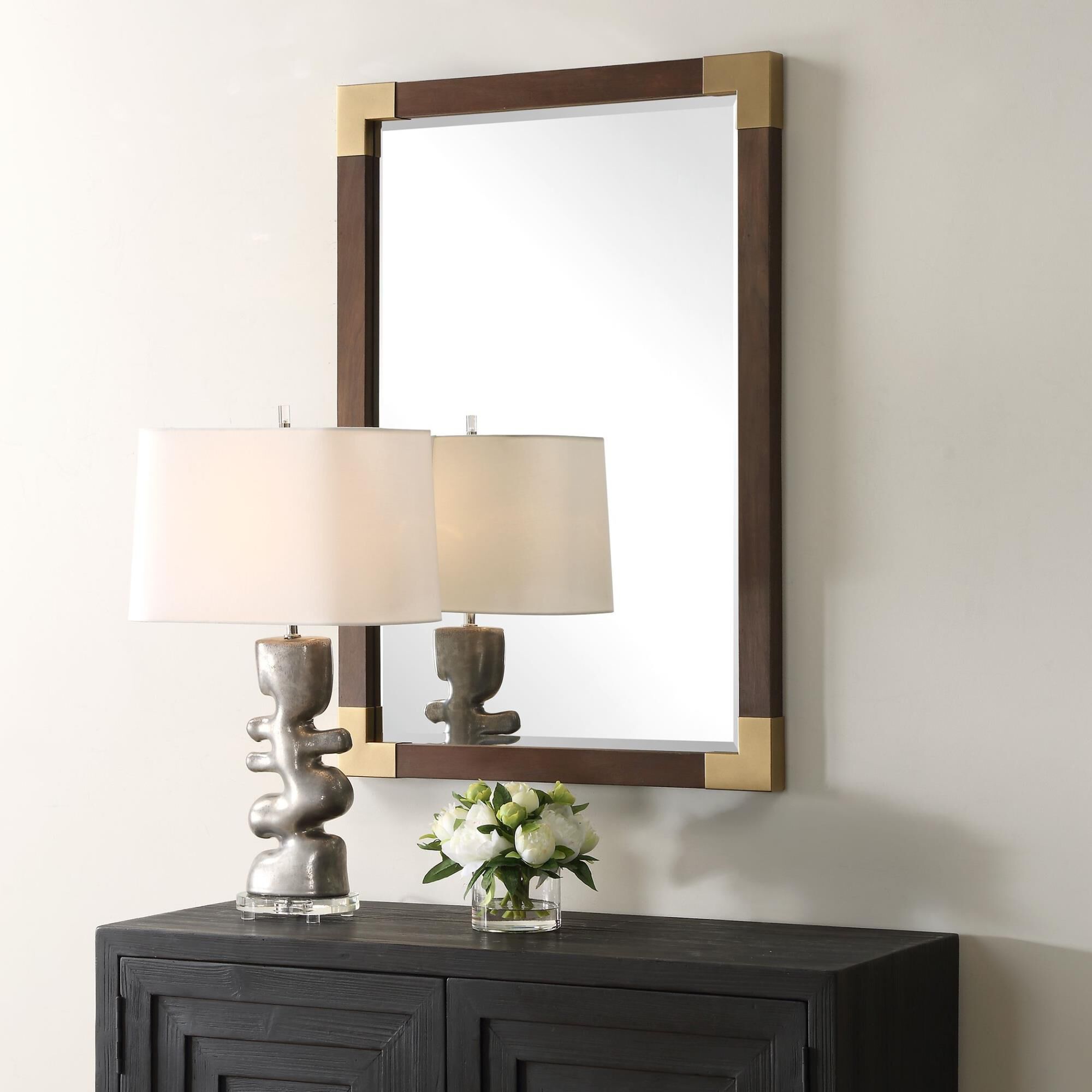 Shown in Embrace Timeless Elegance With Our Solid Wood-Framed Mirror, Finished In An Aged Walnut Veneer. Each finish