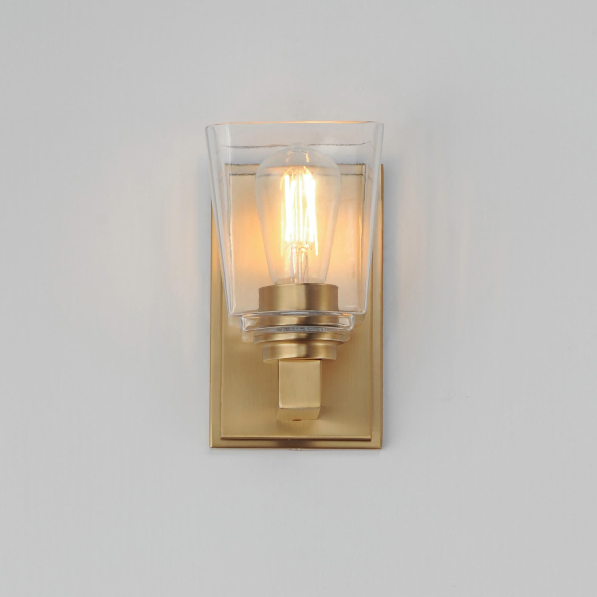 Shown in Natural Aged Brass finish and Clear glass and Glass shade